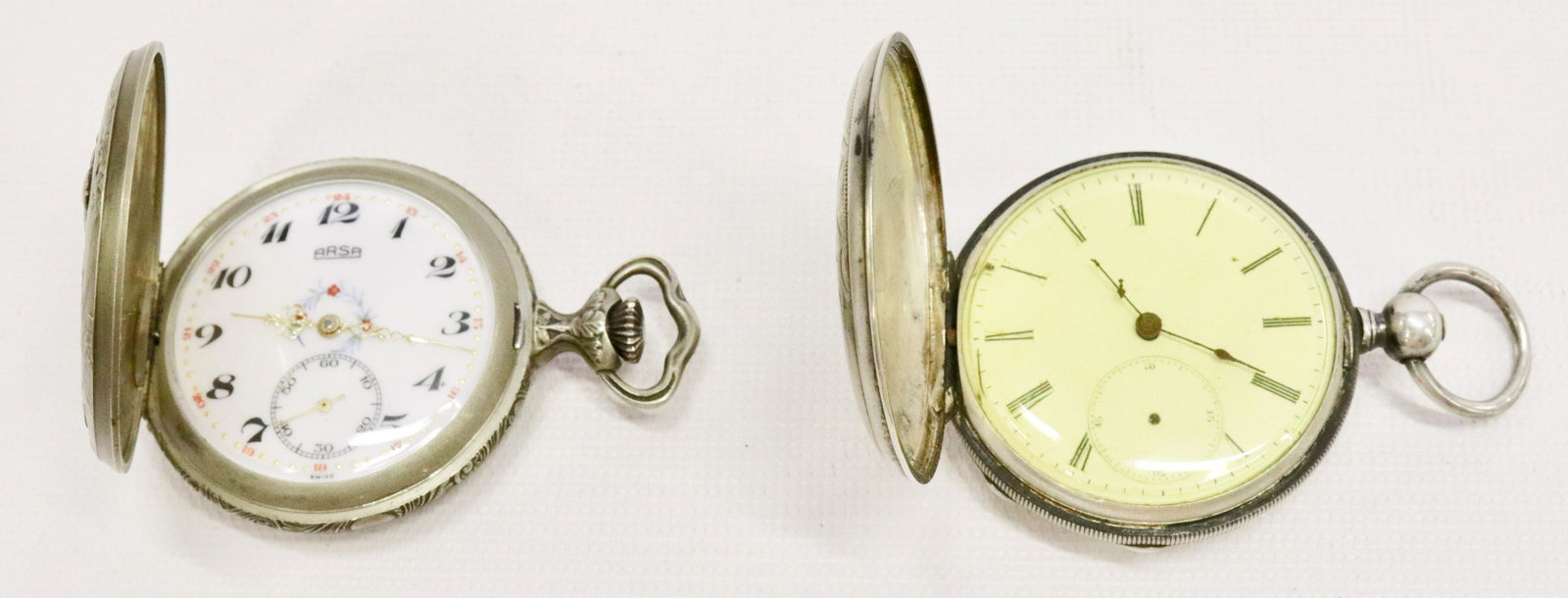 PAIR OF POCKET WATCHES: ONE MRKD. LONGINES, PATENT LEVER, KEY-WIND. THE OTHER AN ARSA WITH HUNTING DECORATION ON CASE FACE MEASURES 1.75" AND 1.5"