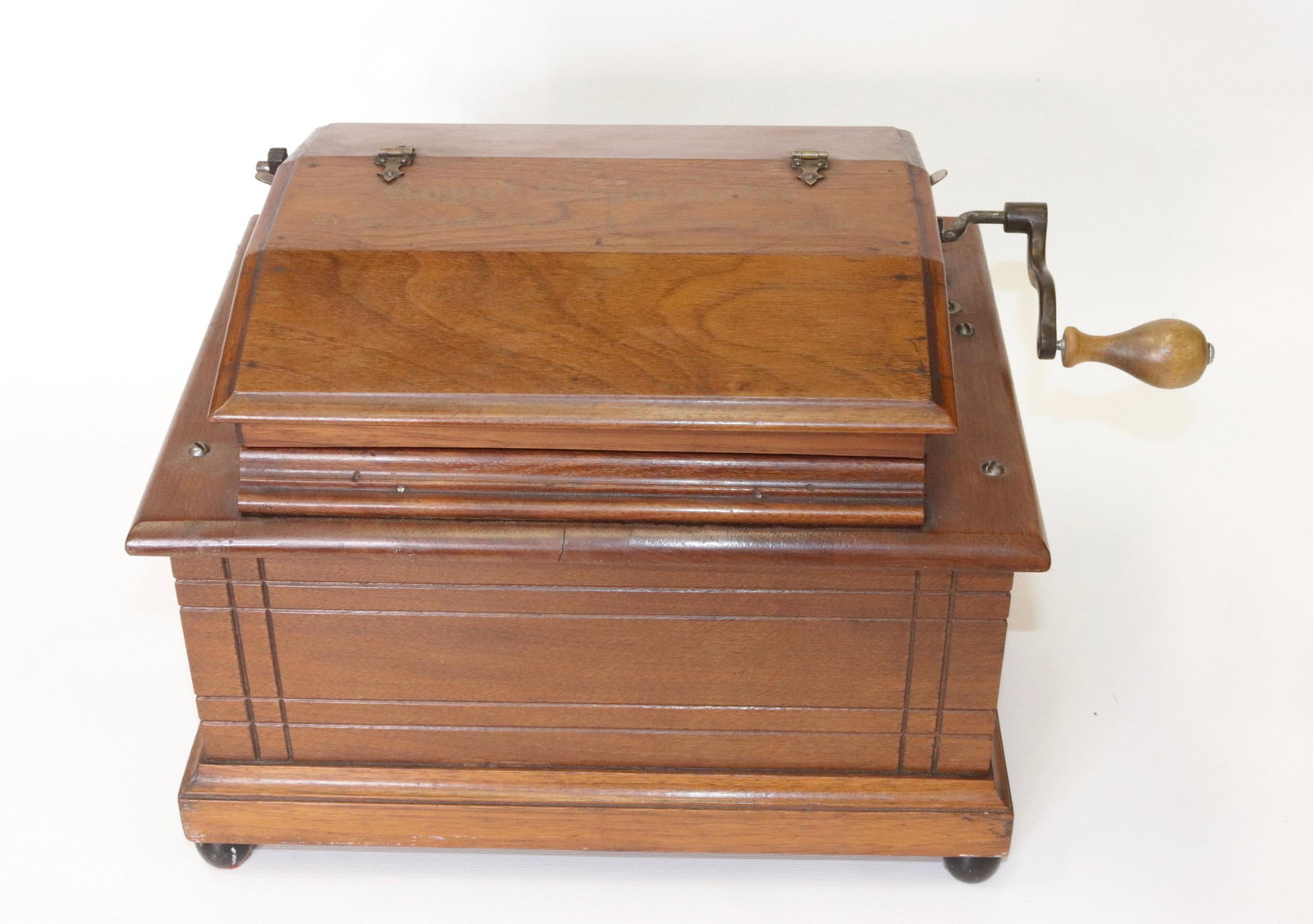 ROYAL ORGUINETTE PAPER ROLLER ORGAN: WALNUT CASE MRKD. BY HER MAJESTY'S ROYAL LETTERS PATENT 9.5" X 12" X 9"