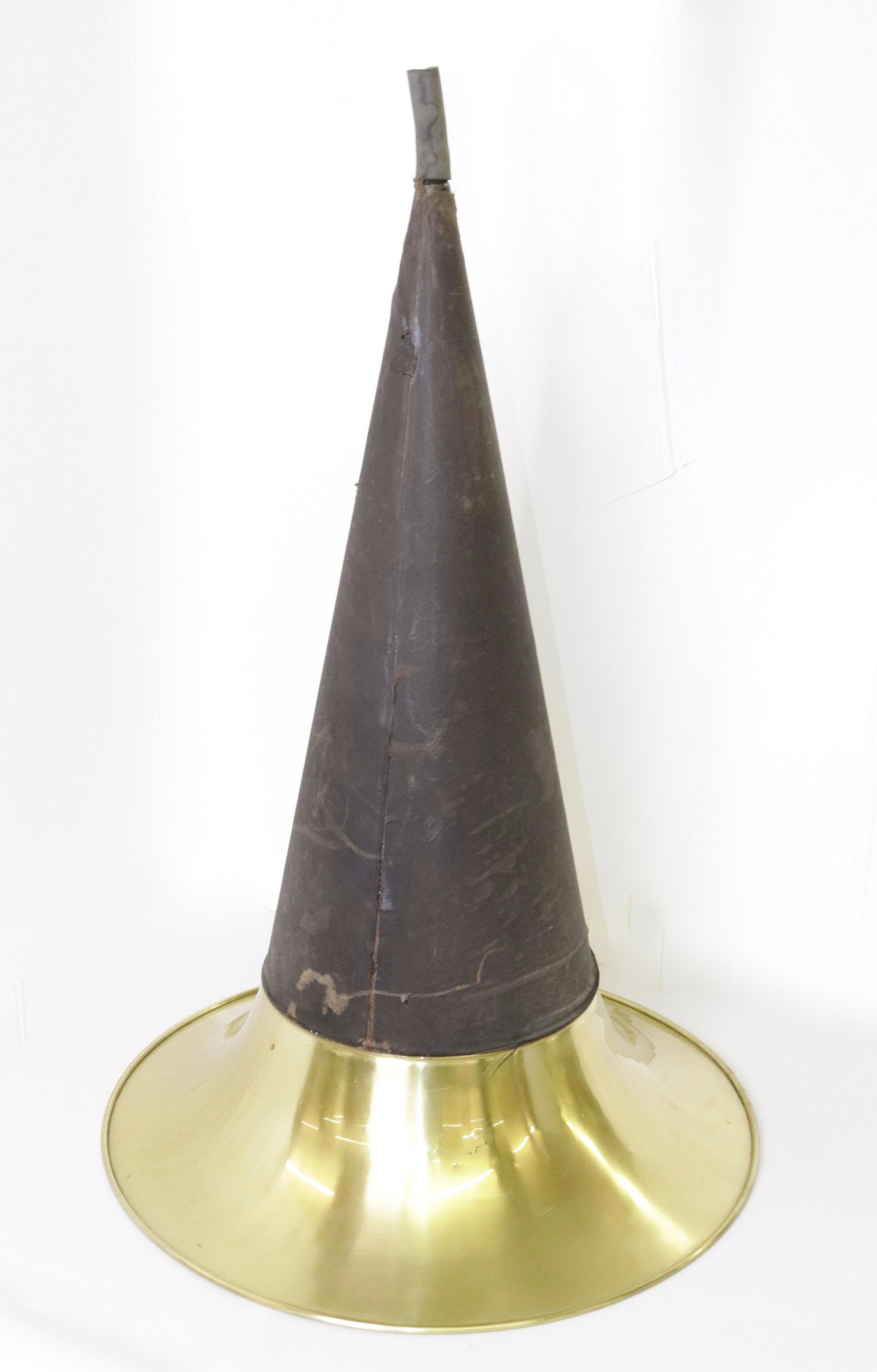 LARGE BRASS PHONOGRAPH HORN: BLACK CANVAS COVERING TIN WITH BRASS END. PARTIAL LABEL. RUBBER ADAPTER ON END 29.5" X 20"