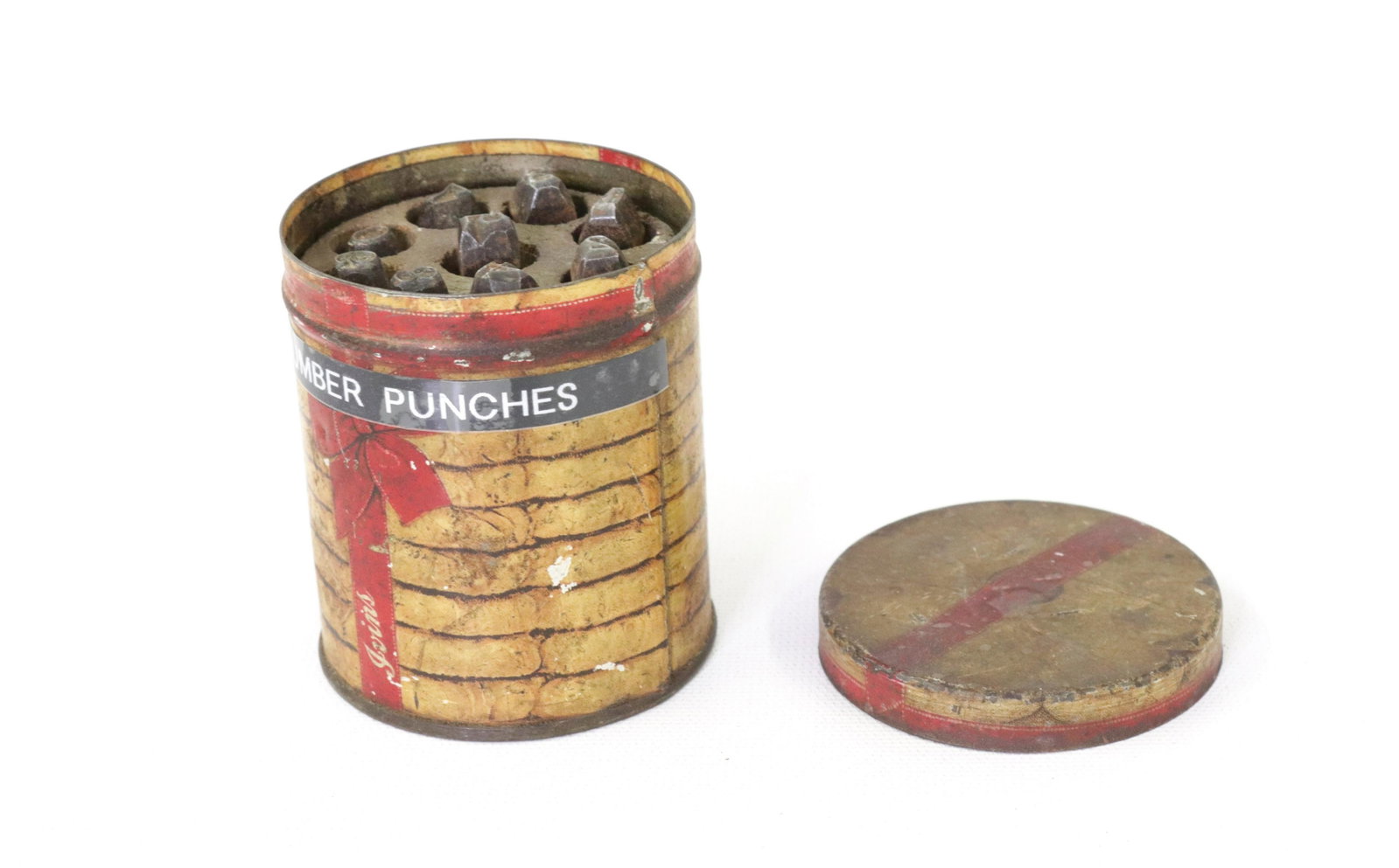 TIN OF NUMBER PUNCHES: 0-9 IN IVINS CRACKER TIN Dimensions 2.5" H
