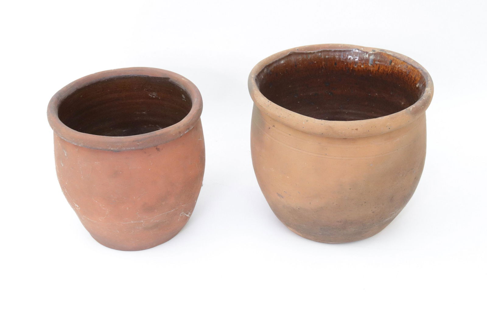 PAIR OF REDWARE CROCKS: GLAZED INTERIORS Dimensions 6.75" TO 7.5" H