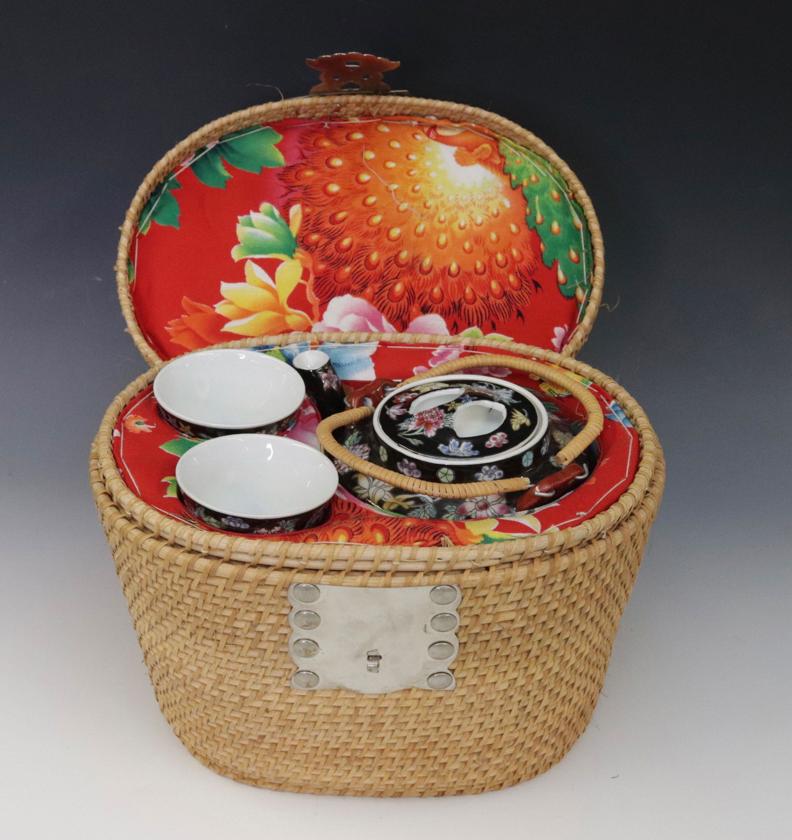 CHINESE TEA SET: PORCELAIN POT WITH TWO CUPS IN WOVEN BASKET. MRKD. MADE IN CHINA Dimensions BASKET 8" X 11"
