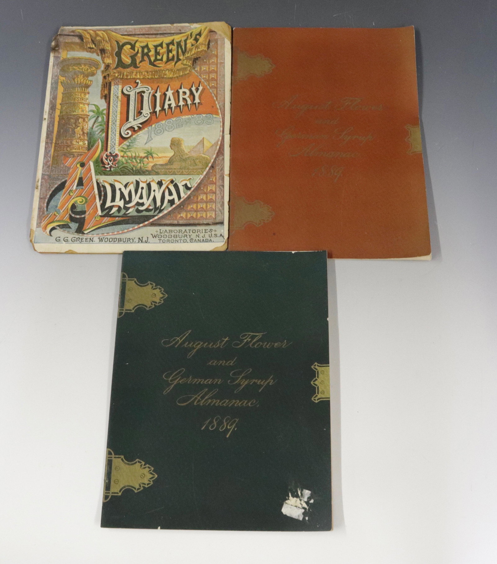 GROUP LOT OF ALMANACS: (3) INCLUDING: TWO AUGUST FLOWER AND GERMAN SYRUP ALMANACS 1889 AND GREEN'S DIARY ALMANAC 1882/83 Dimensions 9" X 7"
