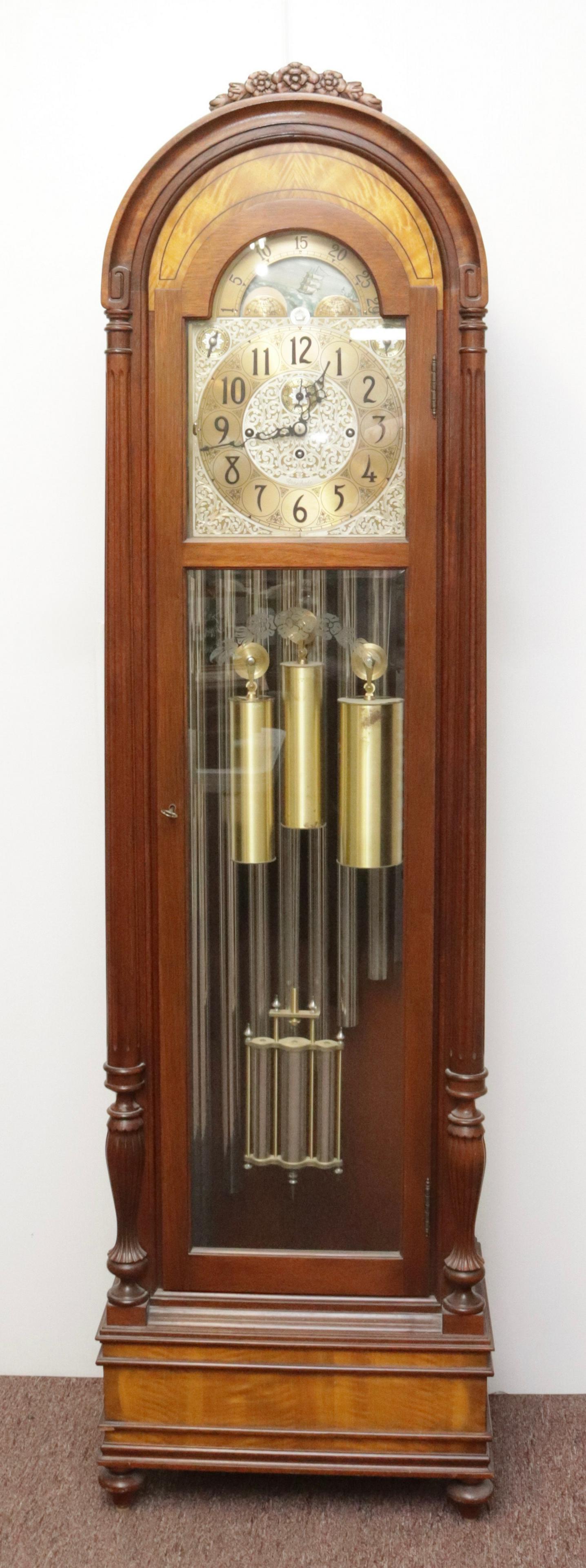 HERSCHEDE NINE TUBE TALL CASE CLOCK: MAHOGANY WITH SATINWOOD. BRASS DIAL. WHITTINGTON, WESTMINSTER AND CANTERBURY CHIMES. BRASS PENDULUM AND CRANK