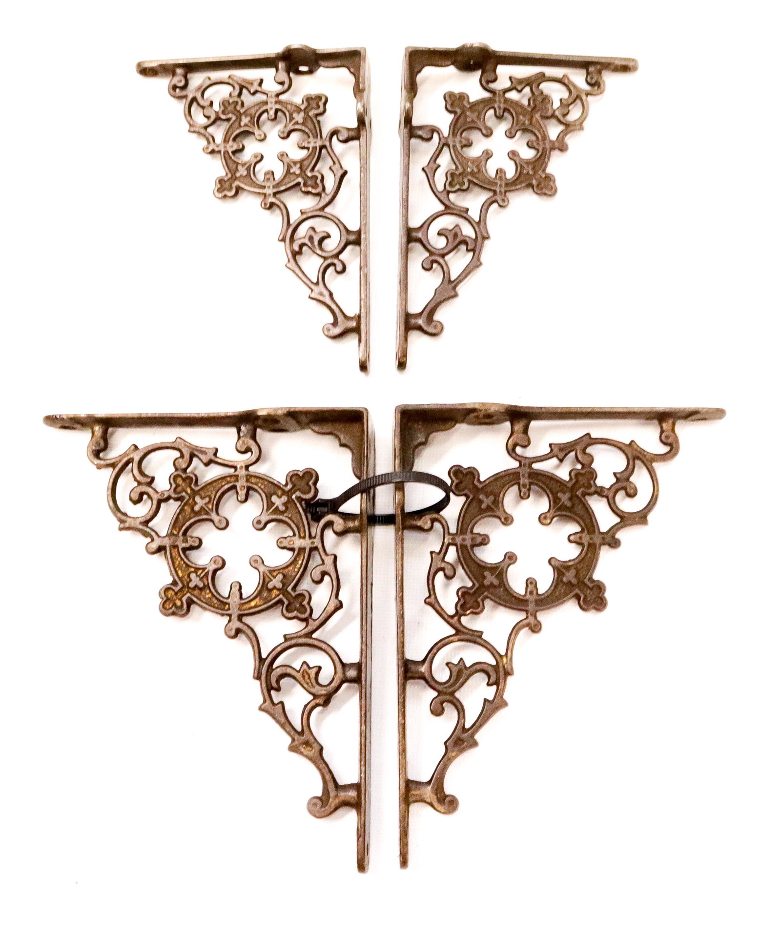 LOT OF CAST IRON SHELF BRACKETS: (2) PAIR OF VICTORIAN SHELF BRACKETS - ONE WITH GOLD PAINTED ACCENTS - NICE DETAIL 5 1/2" X 4" - 6 3/4" X 5"