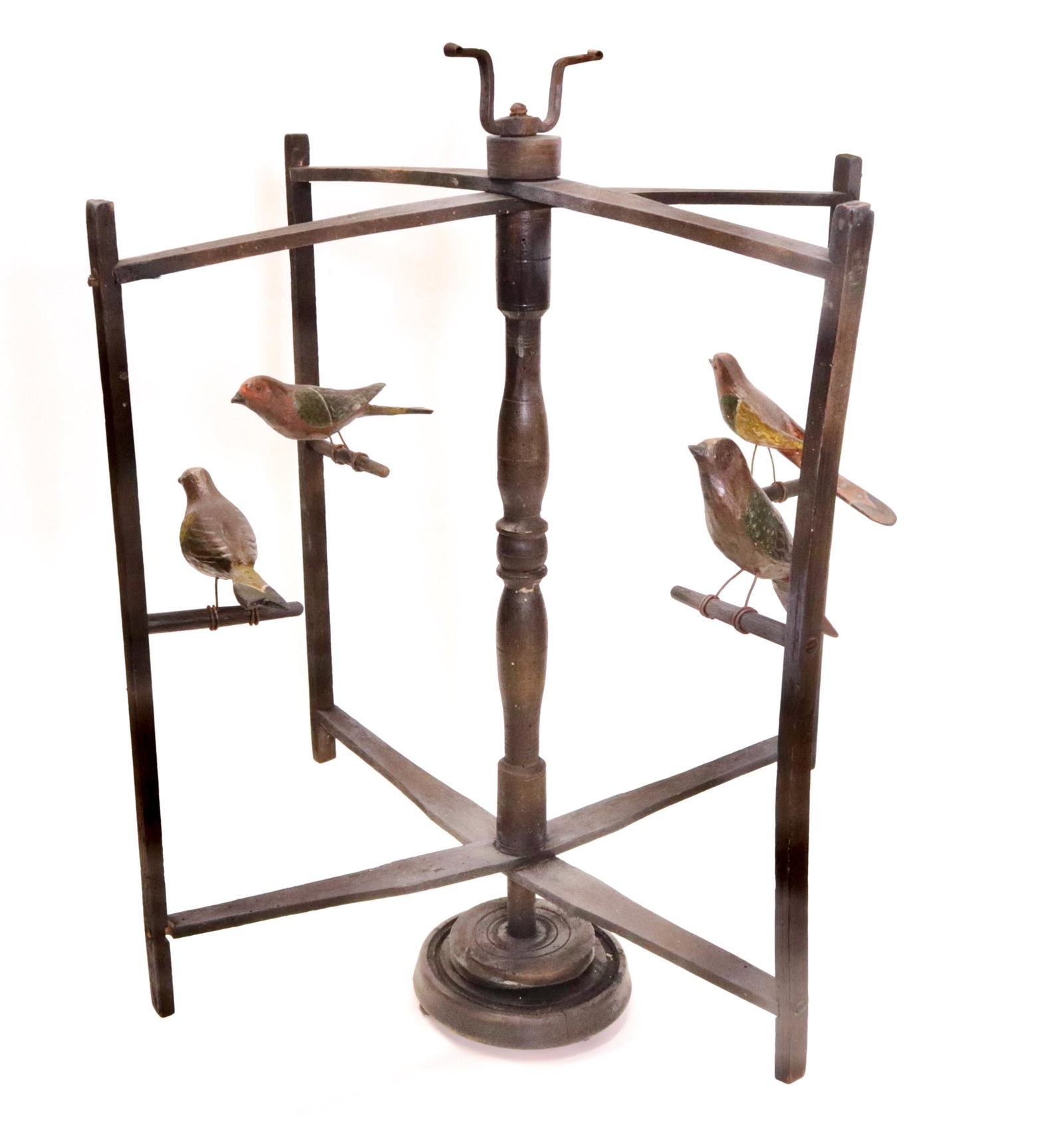 WOODEN FOLK ART BIRD DISPLAY: CARVED AND PAINTED 19TH CENTURY FOLK ART BIRD YARN WINDER ON ROUND BASE WITH PEG LEGS 25 1/4" H X 20 1/4" W