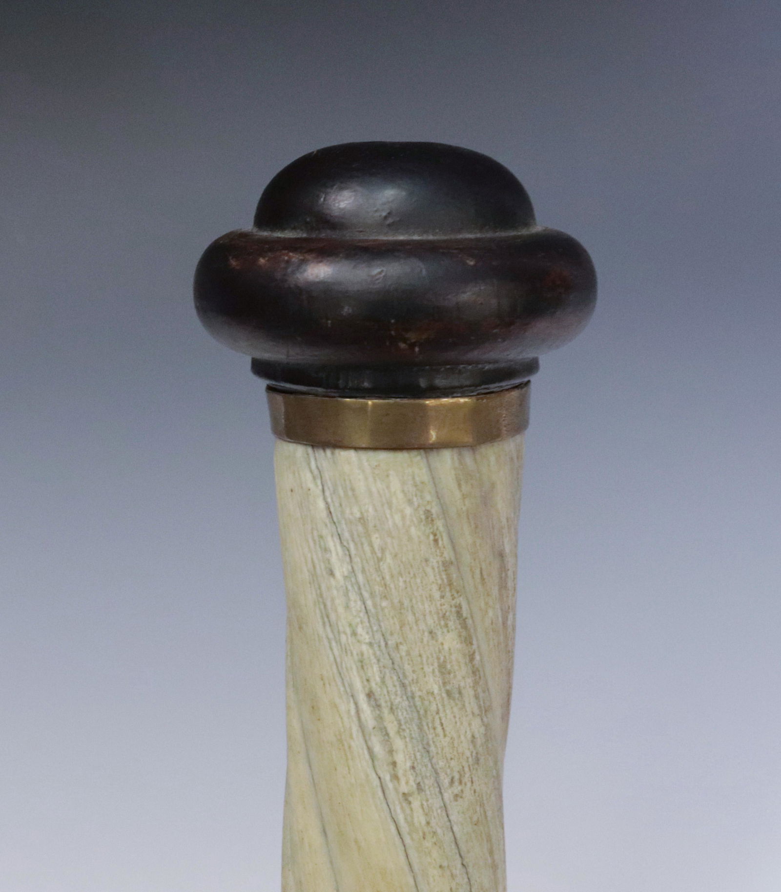 NARWHAL NAUTICAL CANE: VERY WELL DONE AND PATINATED - WOODEN CAP AT END WITH SILVER COLLAR SEPARATES HANDLE AND SHAFT - COMES FROM ONE TOOTH IN NARWHALS MOUTH - CIRCA 1860 37 1/3" L