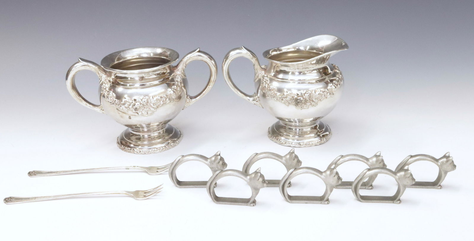 SILVER PLATE LOT: SUGAR AND CREAMER - (2) COCKTAIL FORKS, NAPKIN RINGS AND PEWTER ITEMS