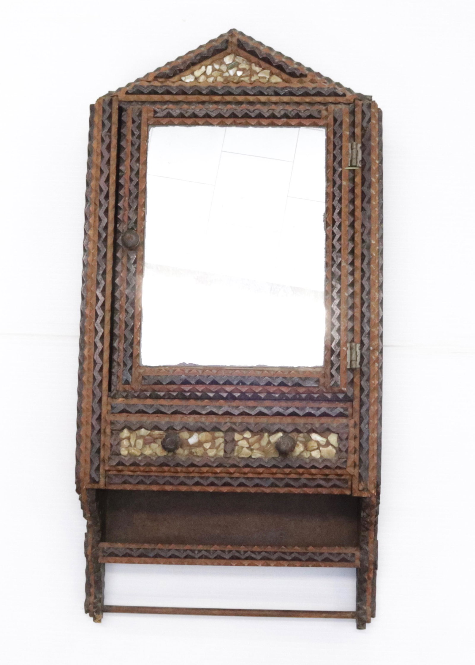TRAMP ART MEDICINE CABINET: CHIP CARVED AND SIDE SHELL DECORATION. SINGLE DOOR OVER ONE DRAWER. 24" X 12" X 4"