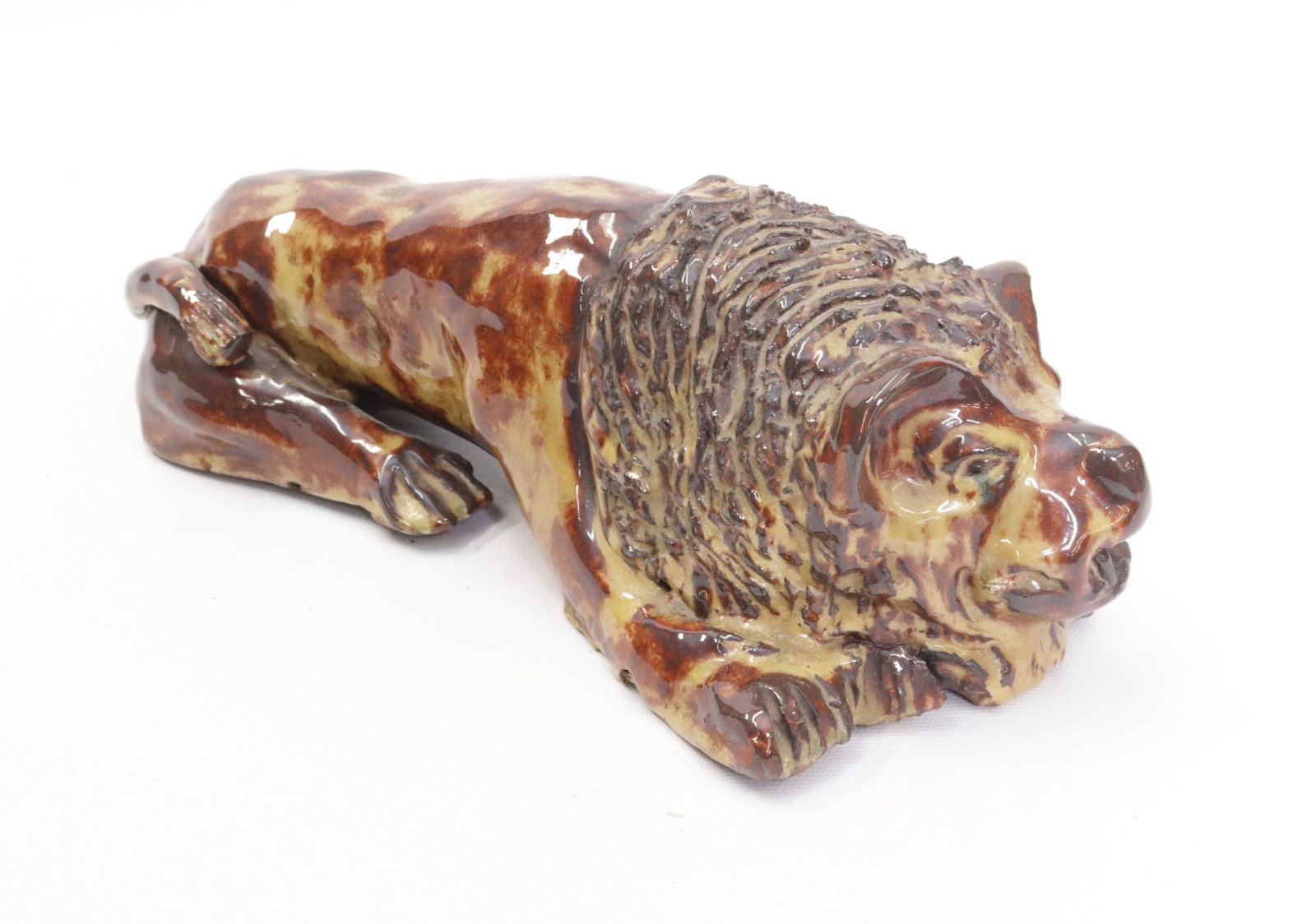 GLAZED POTTERY LION: RECLINING WITH TEXTURED MANE 10 1/2" L