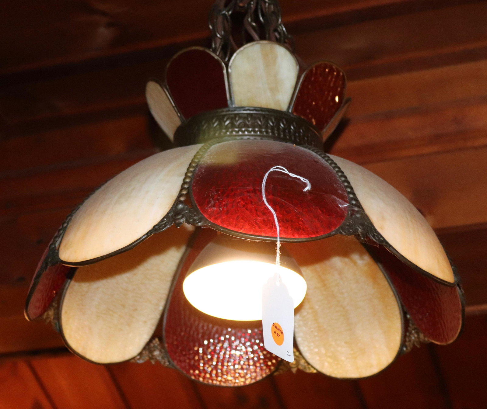 PAIR OF VINTAGE LEADED GLASS SHADES: YELLOW WITH APPLE MOTIF AND DOME SHAPED IN BROWN/YELLOW HANGING SHADES FROM DINING ROOM Size 17" D Disclaimer PLEASE READ BEFORE BIDDING!!! Pick-up will be Tuesday January 5th, 2021 from 9:00am till 5