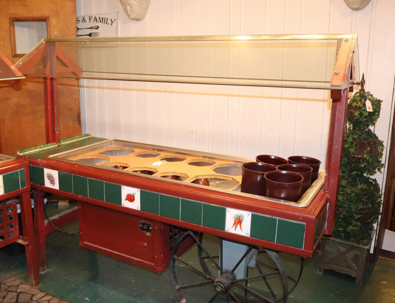 RESTAURANT SALAD BAR CART: WOOD, TILE, GLASS AND STAINLESS WITH IRON WHEELS Size 68" L Disclaimer PLEASE READ BEFORE BIDDING!!! Pick-up will be Tuesday January 5th, 2021 from 9:00am till 5:00pm and Thursday January 7th, 2021 fr