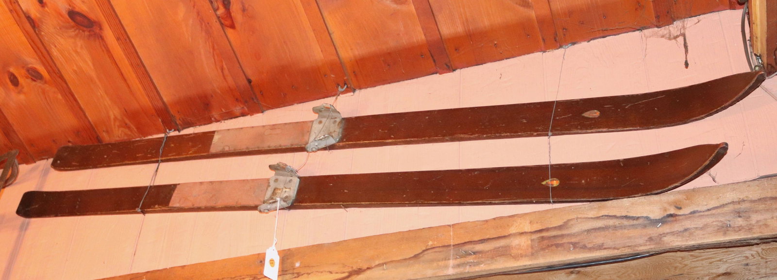 PAIR OF ANTIQUE SKIS: 72" L Disclaimer PLEASE READ BEFORE BIDDING!!! Pick-up will be Tuesday January 5th, 2021 from 9:00am till 5:00pm and Thursday January 7th, 2021 from 9:00am till 5:00pm. Buyers must enter at their own 