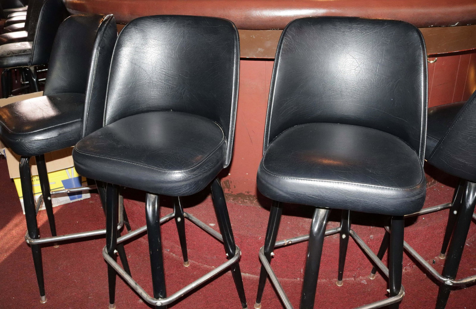 GROUP OF VINYL BARSTOOLS: (7) BLACK SWIVEL STOOLS Size TOTAL HEIGHT 42" Disclaimer PLEASE READ BEFORE BIDDING!!! Pick-up will be Tuesday January 5th, 2021 from 9:00am till 5:00pm and Thursday January 7th, 2021 from 9:00am till