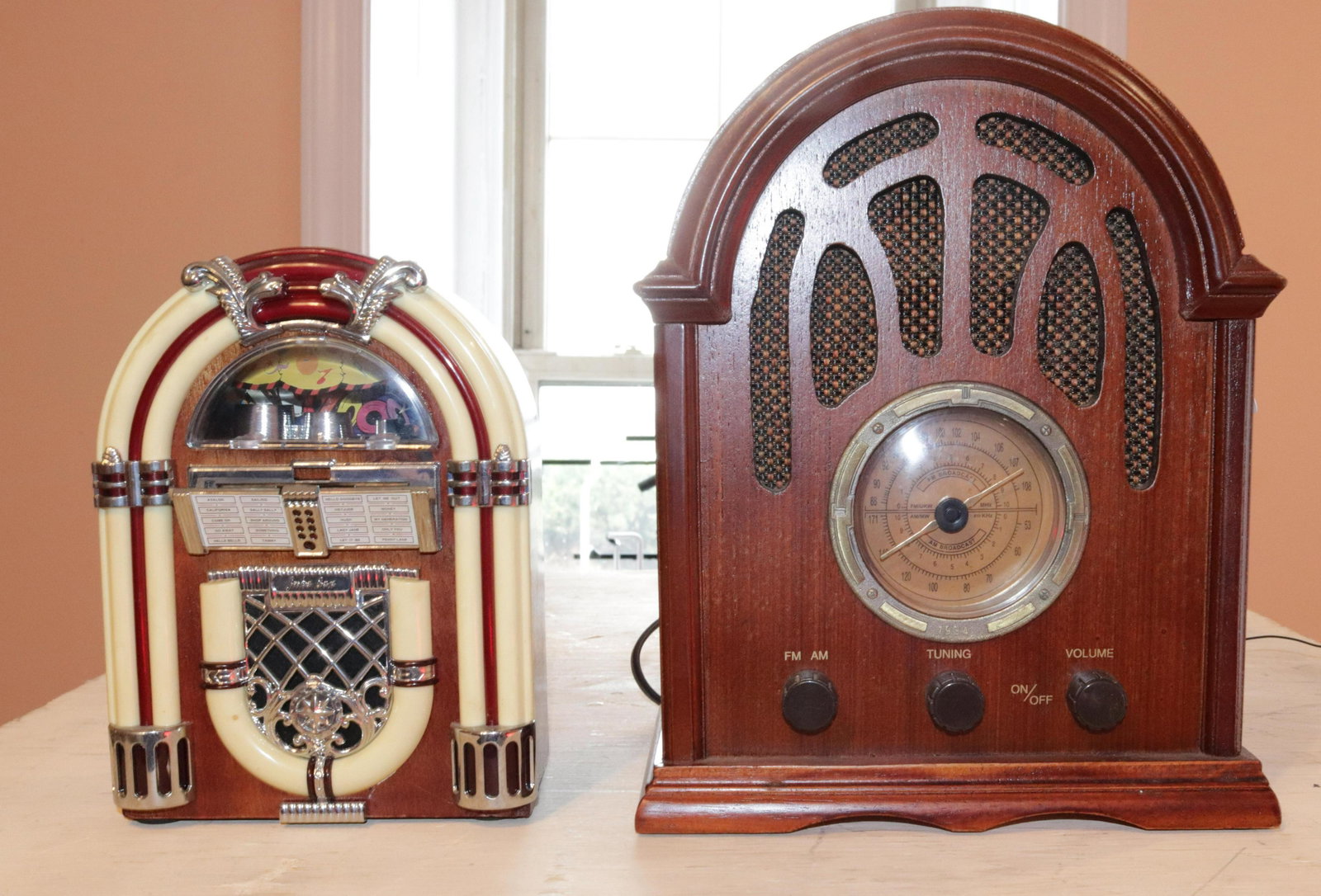 PAIR OF MODERN RADIOS: ONE IN OLD STYLE AND ONE JUKEBOX SHAPED Size TALLEST 11" Disclaimer PLEASE READ BEFORE BIDDING!!! Pick-up will be Tuesday January 5th, 2021 from 9:00am till 5:00pm and Thursday January 7th, 2021 from 