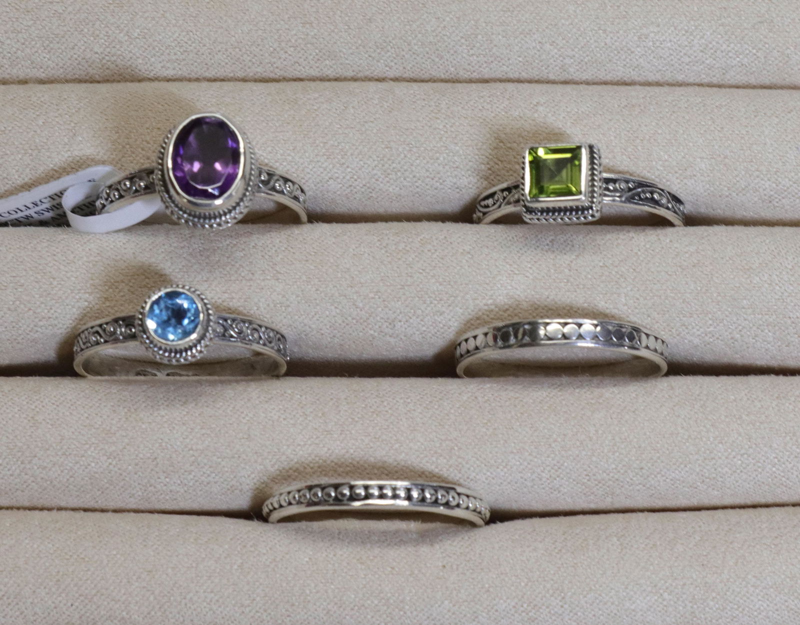 GROUP LOT OF CONTEMPORARY JEWELRY: FIVE STACK RINGS. ONE AMETHYST, ONE BLUE TOPAZ AND ONE CITRINE Size SIZE 9