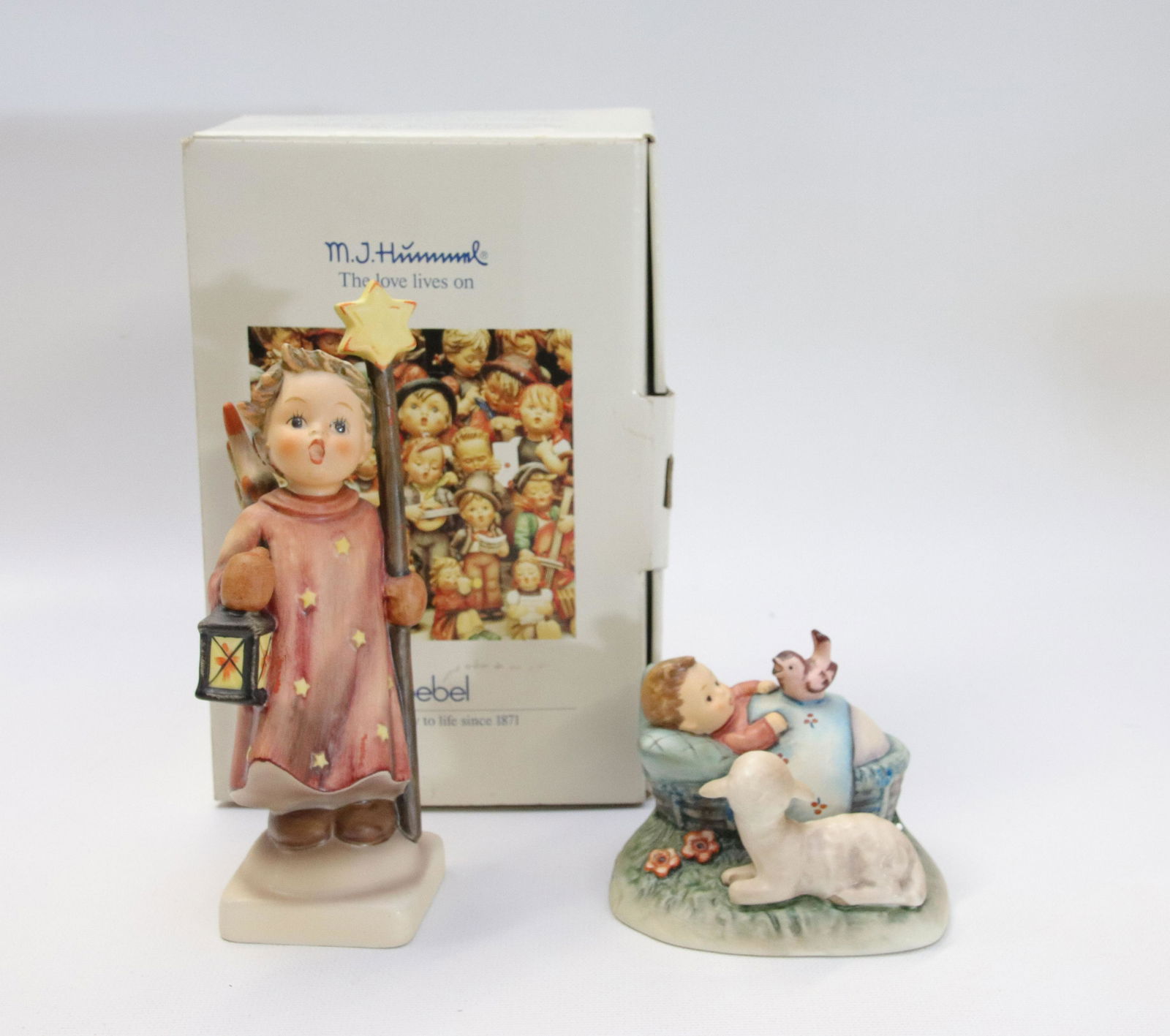 PAIR OF GOEBEL HUMMEL PORCELAIN FIGURES: THE GUARDIAN #455, W. GERMANY WITH BOX AND CHRISTMAS SONG #343, 1981 W. GERMANY Size 2 1/4" TO 6 1/4" H