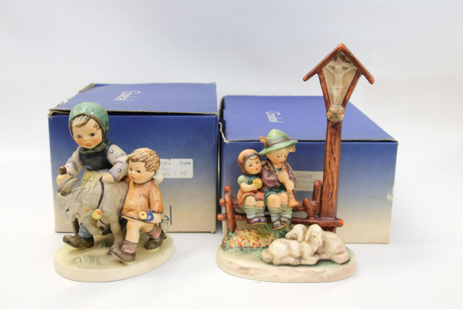 PAIR OF GOEBEL HUMMEL PORCELAIN FIGURES (1 of 3)
