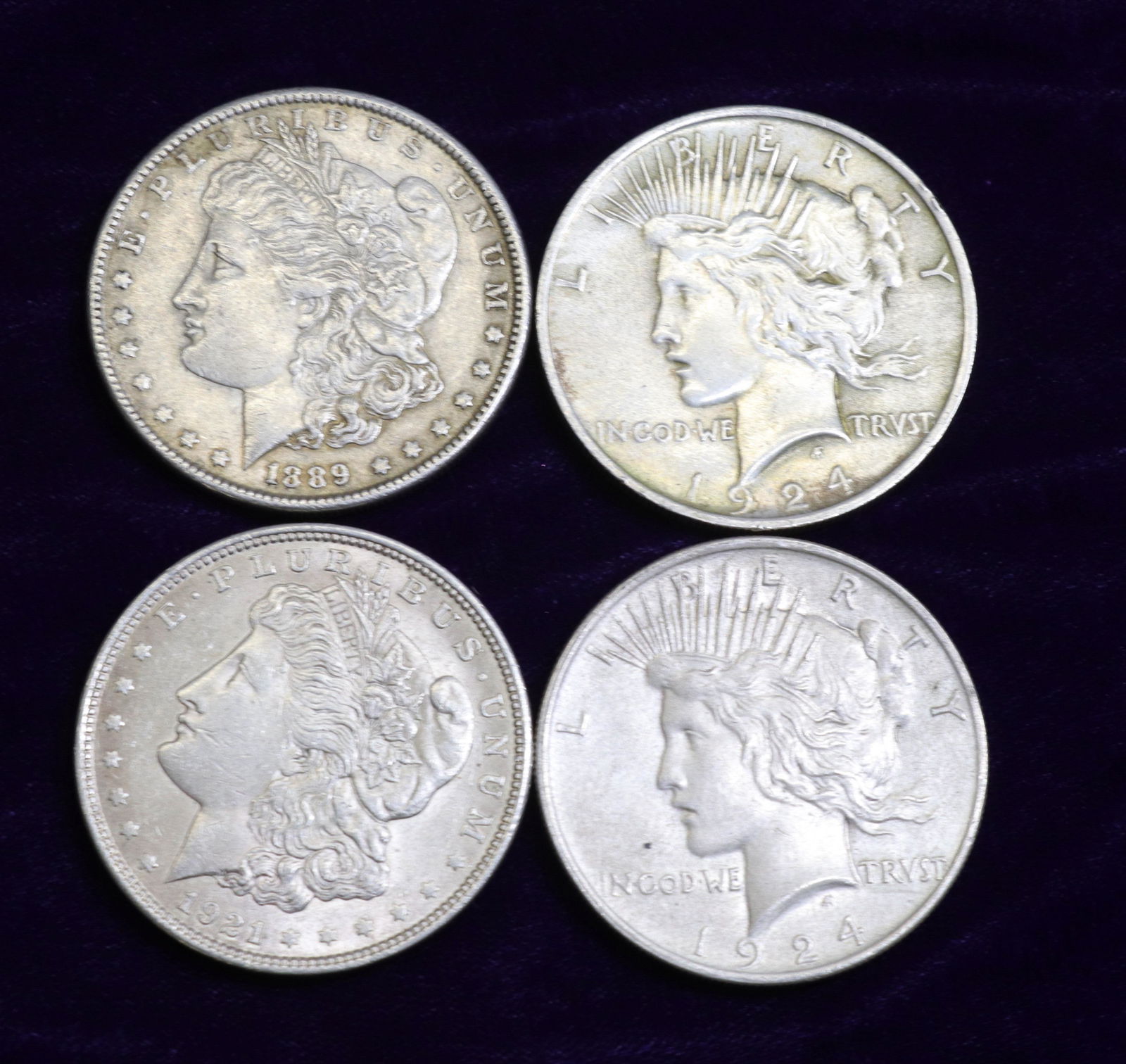 FOUR SILVER DOLLARS (1 of 2)