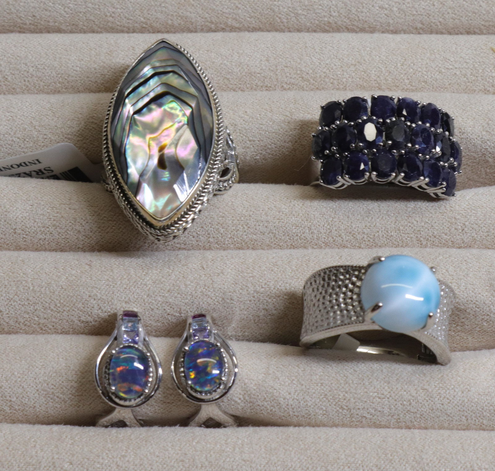 GROUP LOT OF CONTEMPORARY JEWELRY: NEW IN BOX. ALL STERLING SILVER. THREE RINGS AND PAIR OF EARRINGS. LARIMAR, DARK BLUE SAPPHIRE, ABALONE AND WATER OPAL Size RINGS SIZE 9