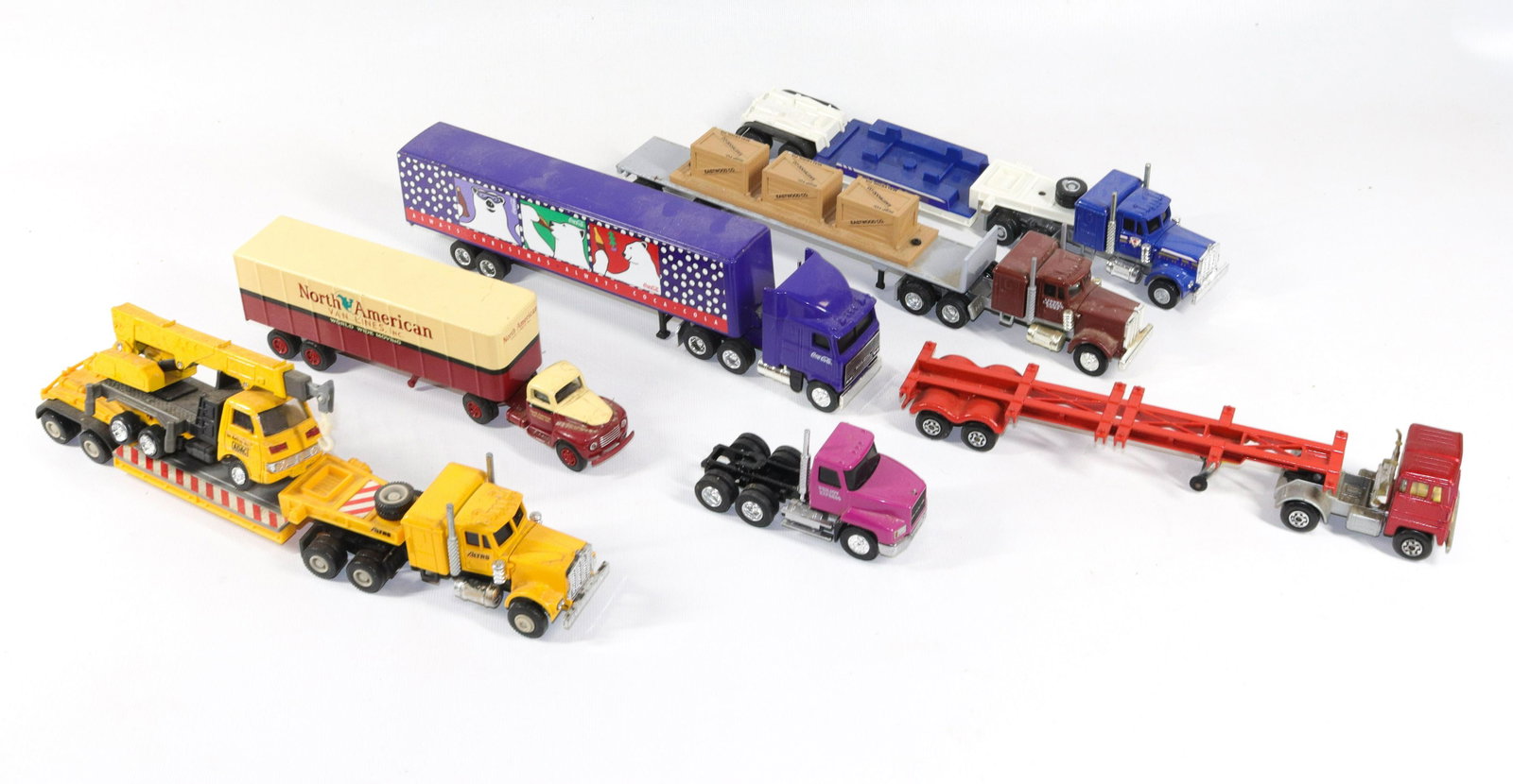 LOT OF DIECAST VEHICLES: 7 DIECAST TRACTOR TRAILERS