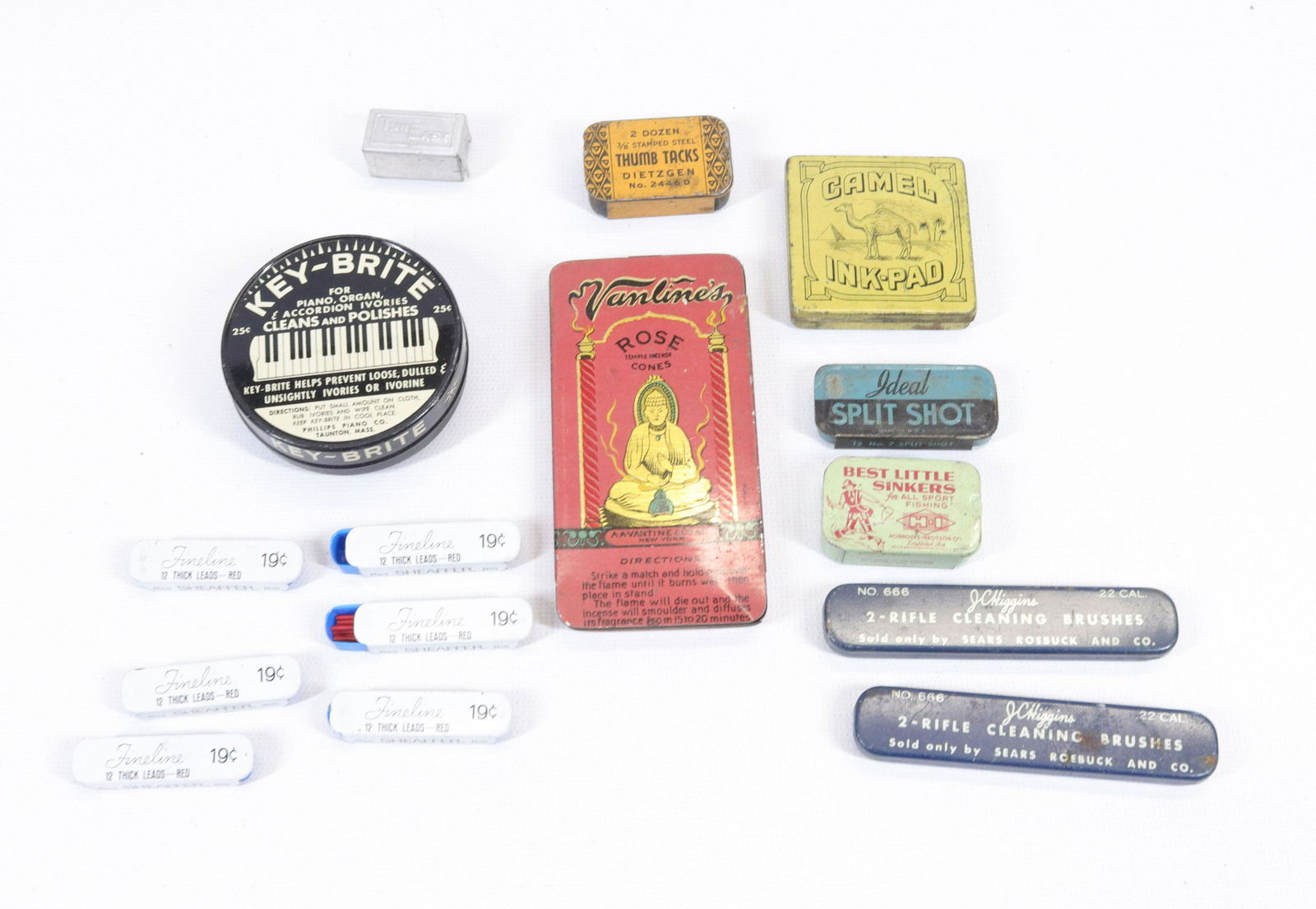 GROUP LOT OF ADVERTISING TINS: (15) MINI ADVERTISING TINS INCLUDING: VANELINE'S ROSE CONES, CAMEL INK-PAD, JC HIGGINS CLEANING BRUSHES AND MORE Dimensions 1" TO 4" L