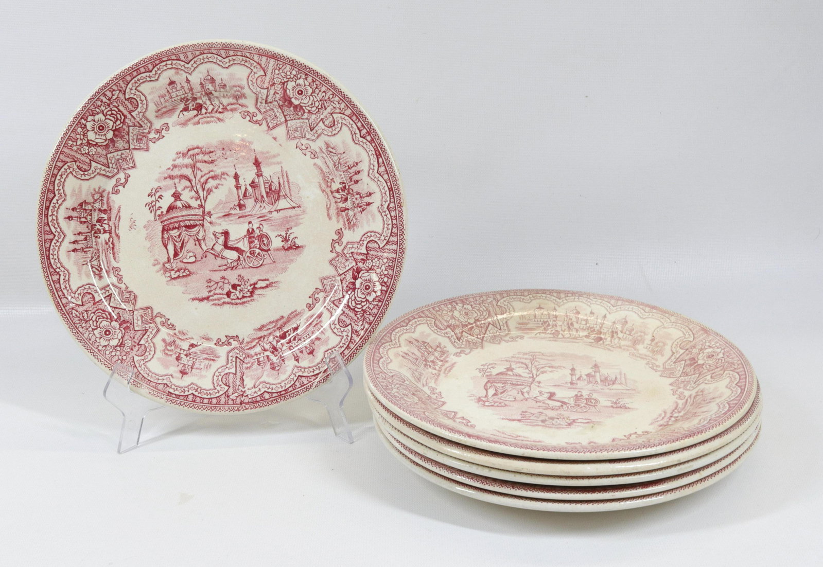 SIX TRANSFERWARE PLATES: RED AND WHITE CHARIOT PATTERN. UNMARKED Dimensions 9 1/4" D