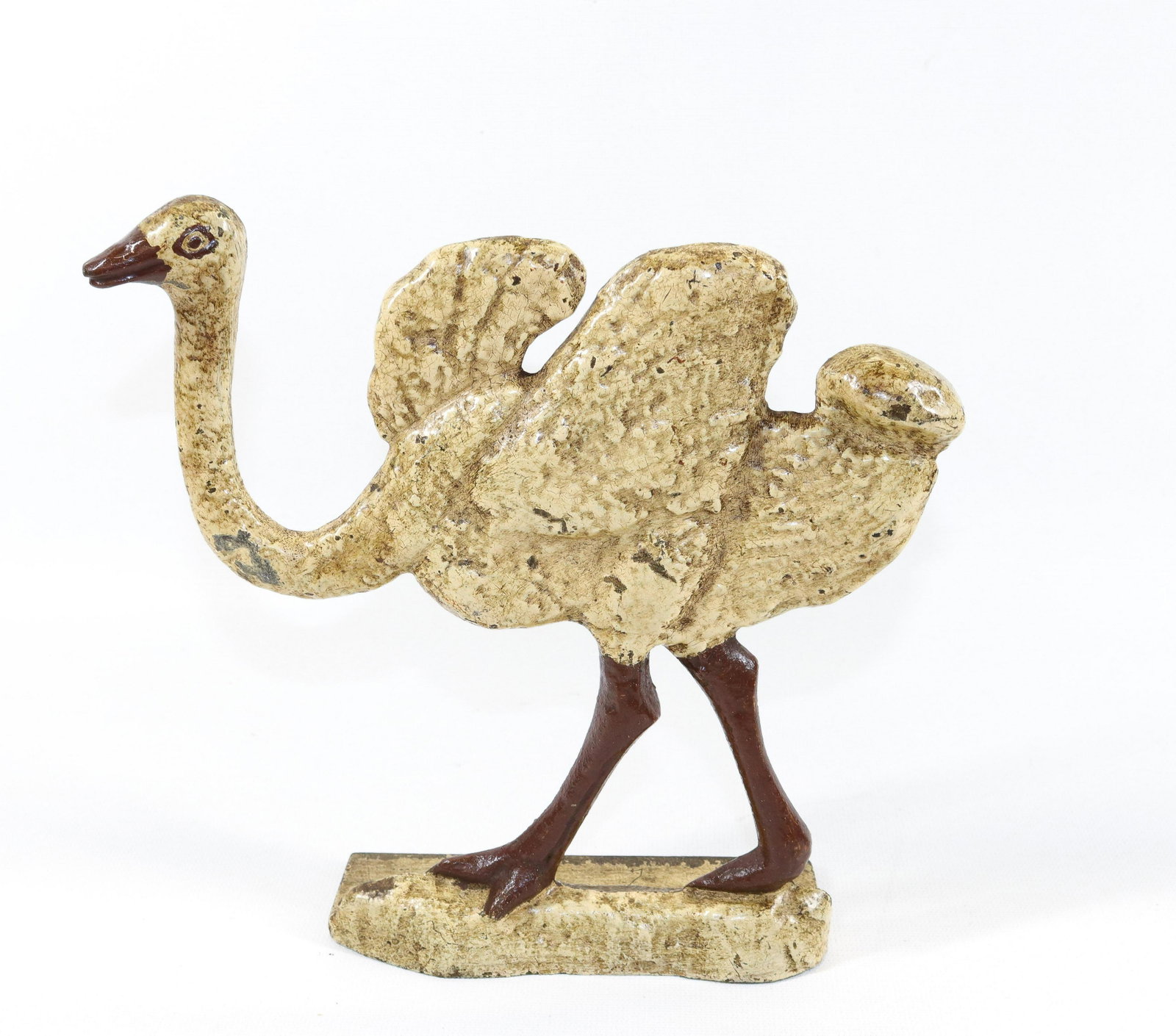 CAST IRON OSTRICH DOORSTOP: PAINTED SURFACE. NUMBERED ON BACK Dimensions 8 1/2" X 8 1/2"