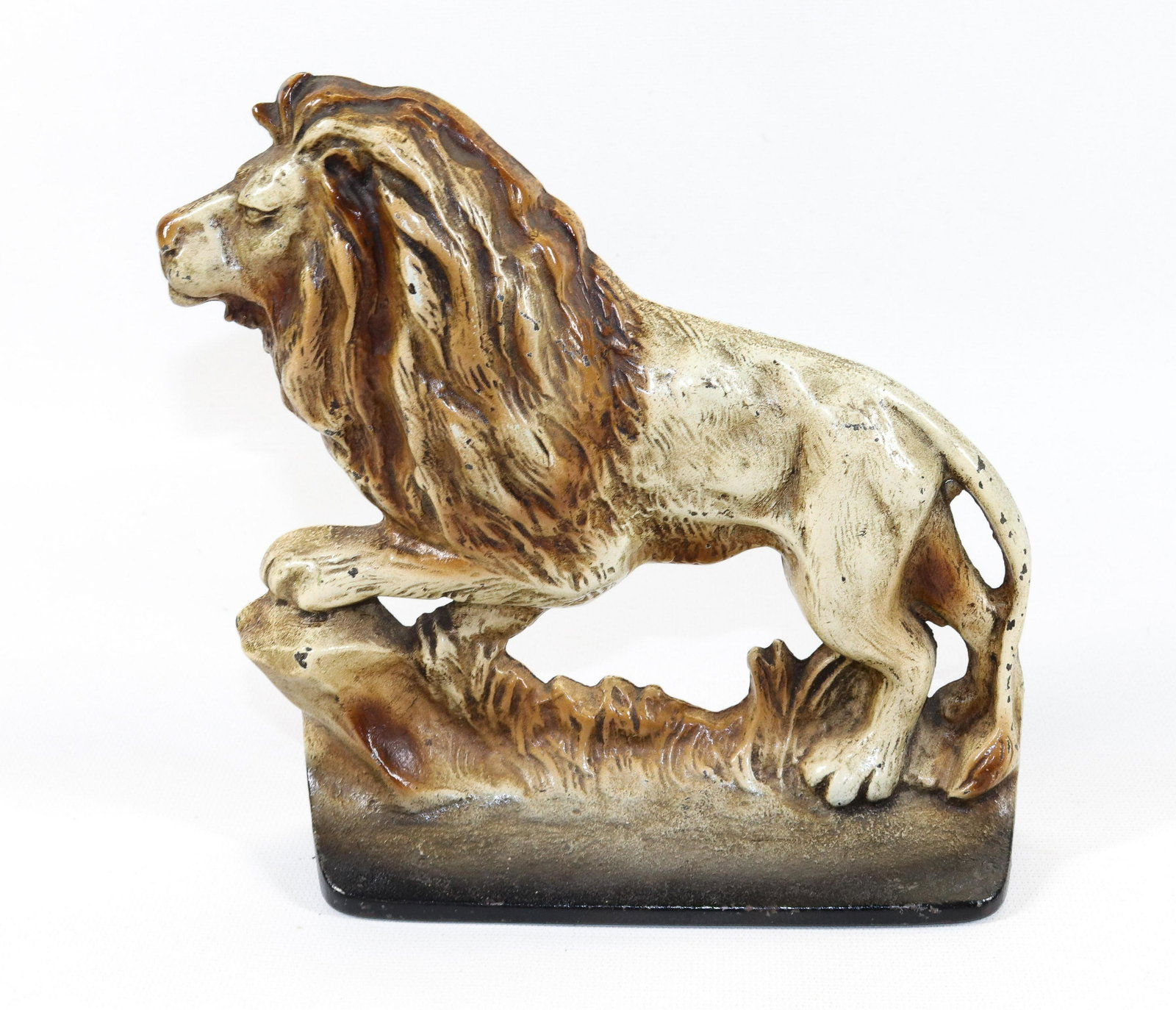 CAST IRON LION DOORSTOP: PAINTED SURFACE. CREATION CO. DATED 1930 Dimensions 7 1/4" X 7 1/4"