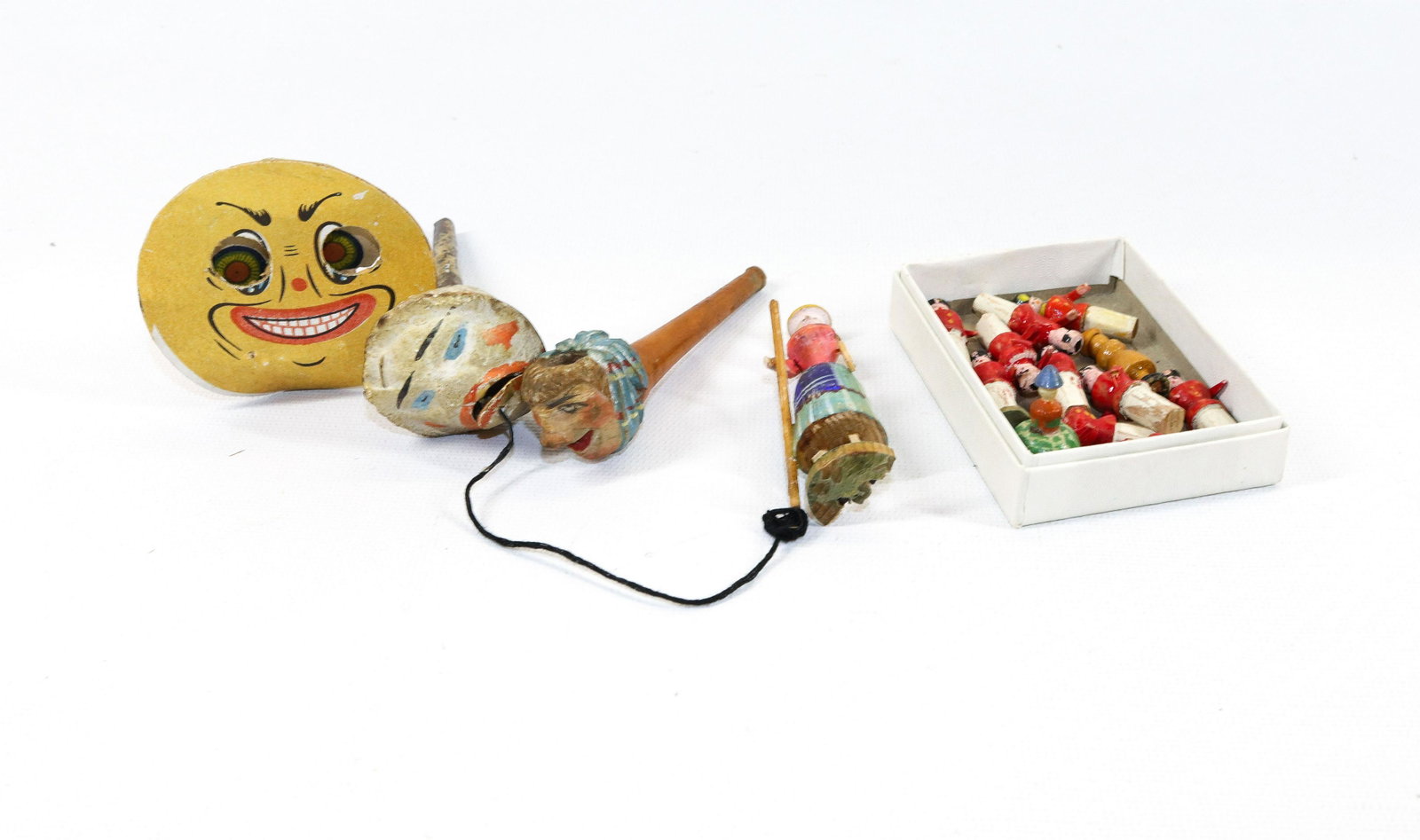 GROUP LOT OF ANTIQUE TOYS: CARVED WOODEN SOLDIERS, LADY, COMPOSITION HORN, CARVED PIPE AND PAPER/WOOD HALLOWEEN PUMPKIN FACE Dimensions PUMPKIN 2 1/2" D