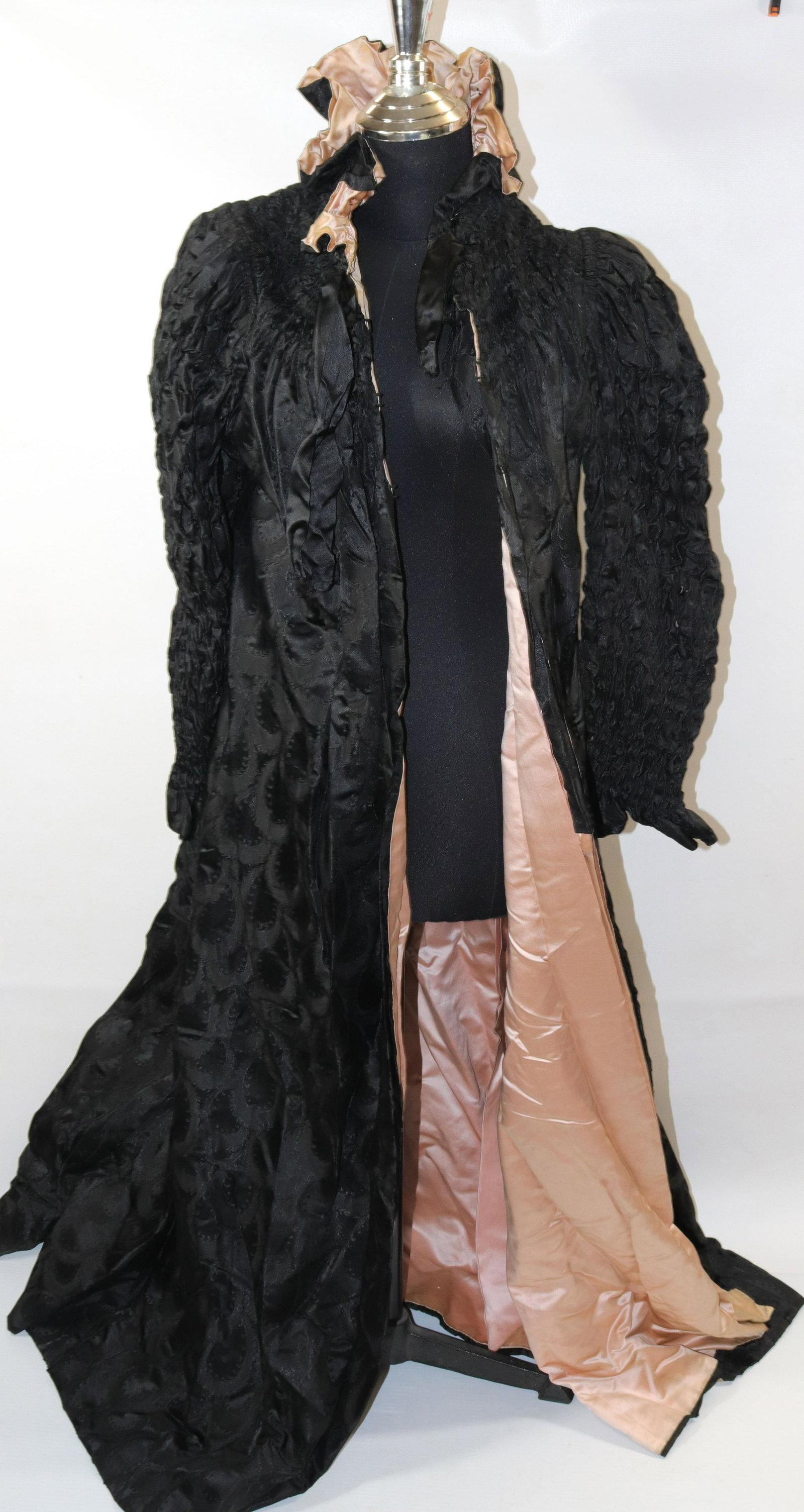 VINTAGE LADY'S DRESS AND COAT: BLACK SHEER AND BEADED DRESS. LONG BLACK COAT WITH PALE PINK LINING. GATHERED SLEEVES WITH OVERALL PAISLEY PATTERN
