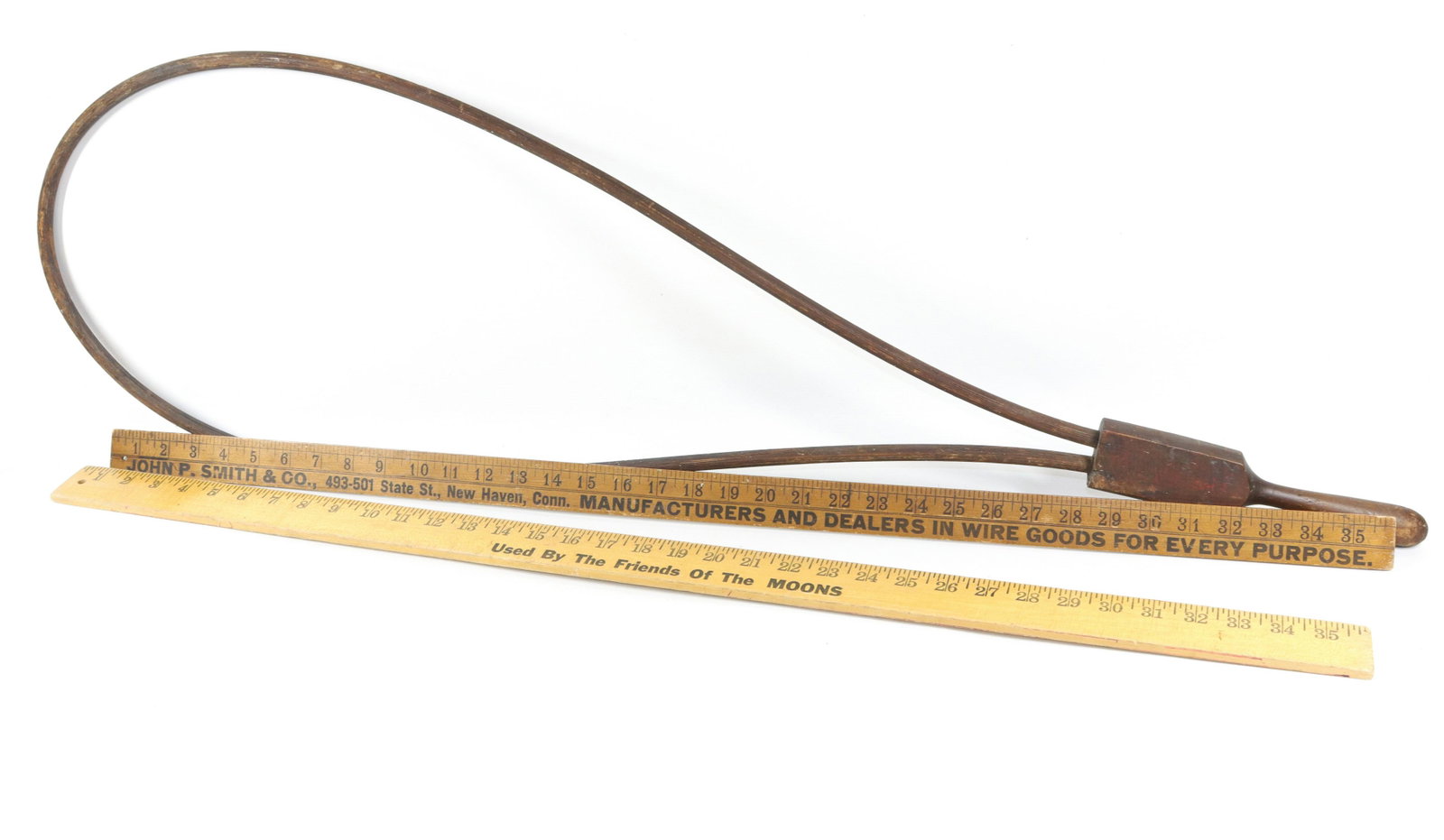 WOODEN RUG BEATER AND ADVERTISING YARDSTICKS: BENTWOOD BEATER AND PAIR OF YARD STICKS. "JOHN P. SMITH, NEW HAVEN, CT DEALERS IN WIRE" Dimensions BEATER 39" L