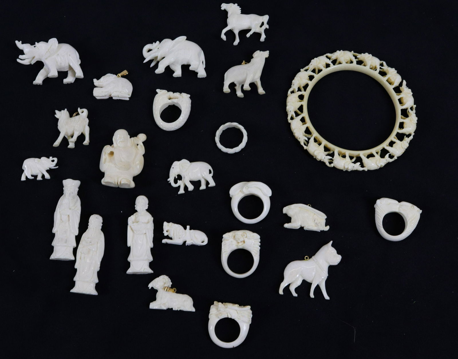 GROUP LOT OF BONE JEWELRY: INCLUDING: RINGS, BRACELET, FIGURES AND PENDANTS Dimensions BRACELET 3 1/2" ACROSS