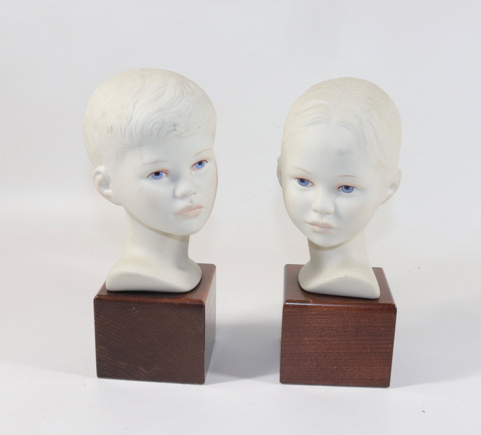 PAIR OF PORCELAIN CHILDREN BUSTS: SIGNED CYBIS Dimensions 9 1/2" H