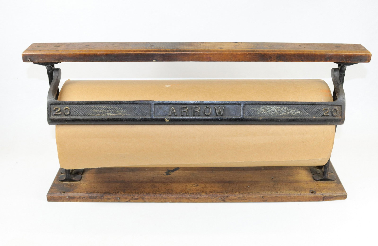 ANTIQUE PAPER HOLDER: WOOD AND CAST IRON. MRKD. ARROW. BROWN PAPER ROLL Dimensions 13" X 25"
