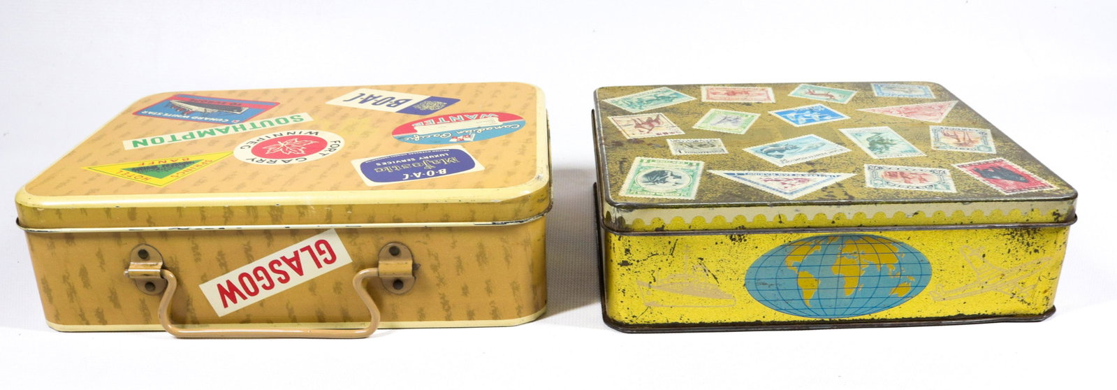 PAIR OF TIN BISCUIT TINS: INCLUDING: WESTON'S "STAMPS OF THE WORLD" CIRCA 1950 AND GRAY DUNN BEIGE SUITCASE CIRCA 1950 2" X 7 1/4" AND 2 3/8" X 8 1/2"