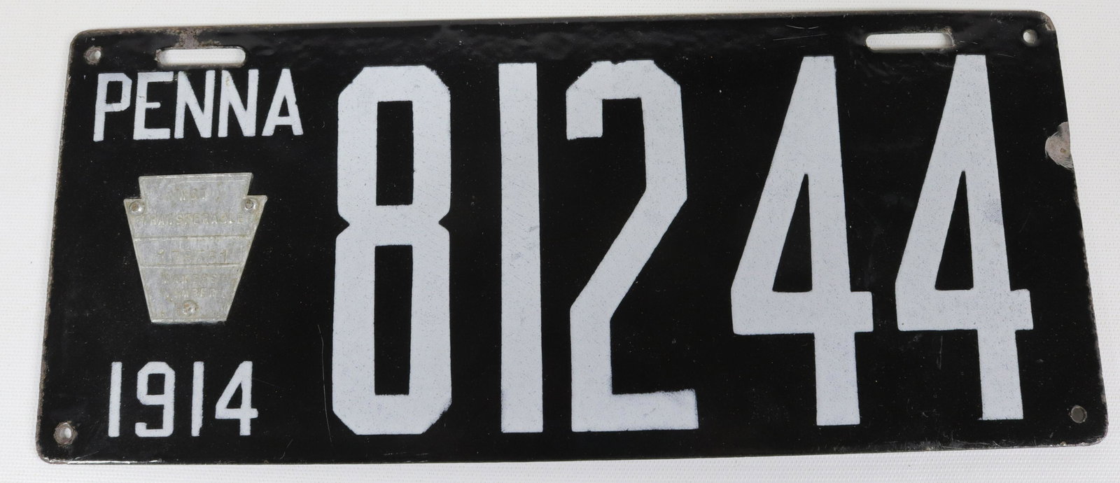 1914 PENNSYLVANIA PORCELAIN LICENSE PLATE: #81244, BRILLIANT MFG. CO. PHILADELPHIA, PA - KEYSTONE BADGE# 178561 6" X 14"