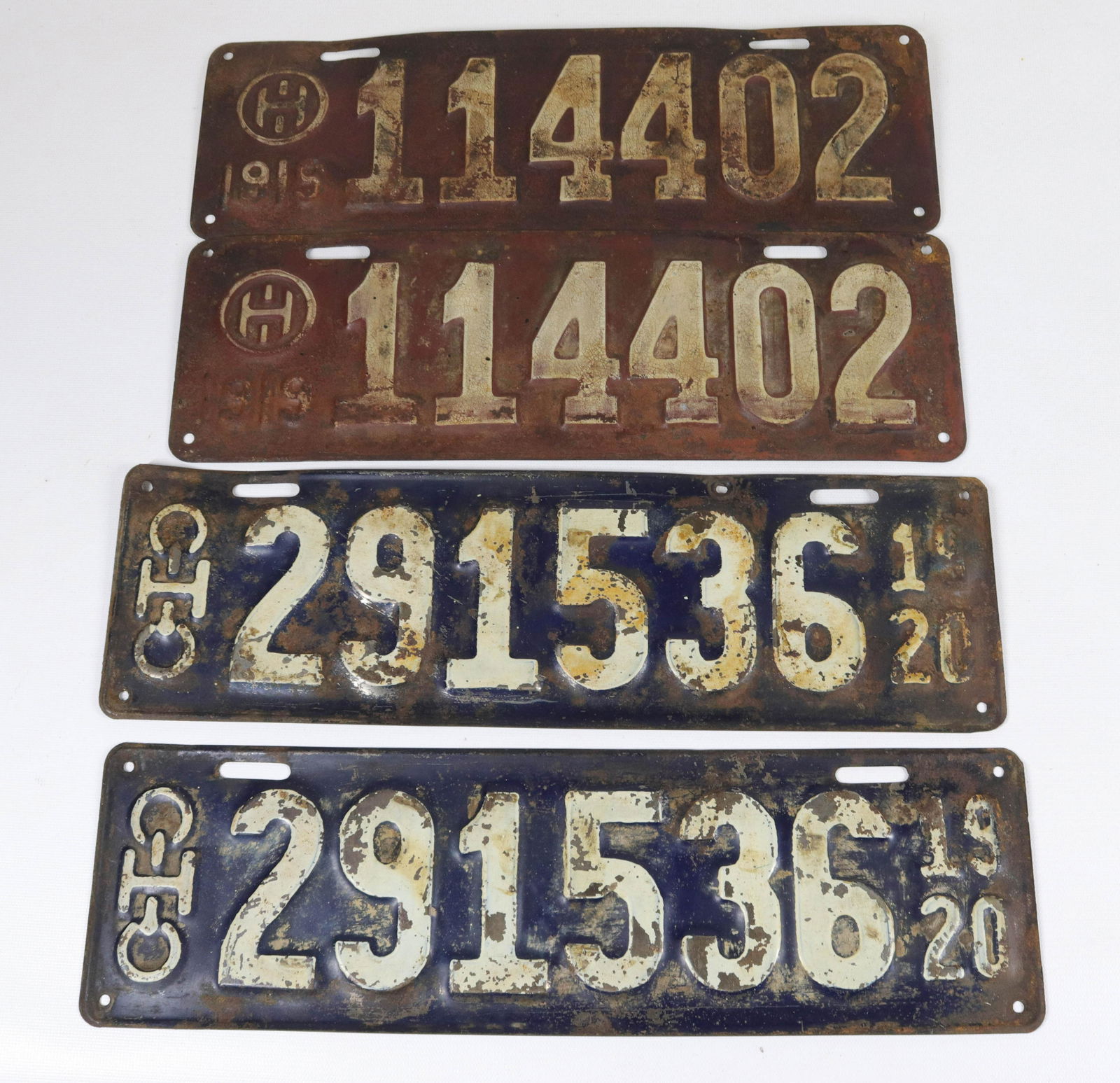 OHIO LICENSE PLATE GROUP: 1919 PRESSED STEEL MATCHING PAIR #114402 AND 1920 PRESSED STEEL MATCHING PAIR #291536 14 3/4" TO 15 3/4" LENGTH