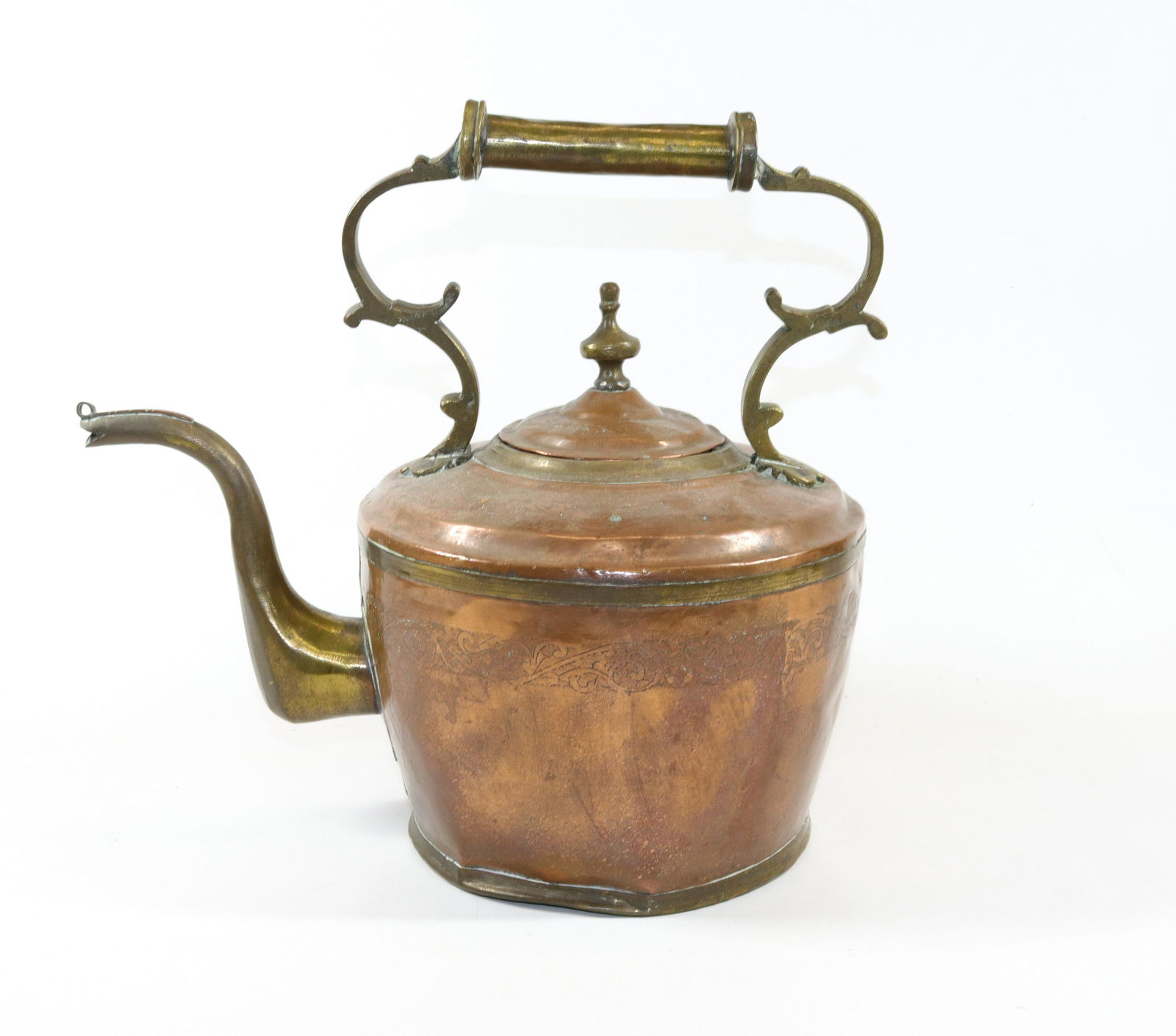 EARLY DECORATED COPPER TEA KETTLE: INCISED COPPER DECORATION WITH BRASS SPOUT AND HANDLE Size: 13" X 14". DIAMETER 7 1/2" ON BOTTOM