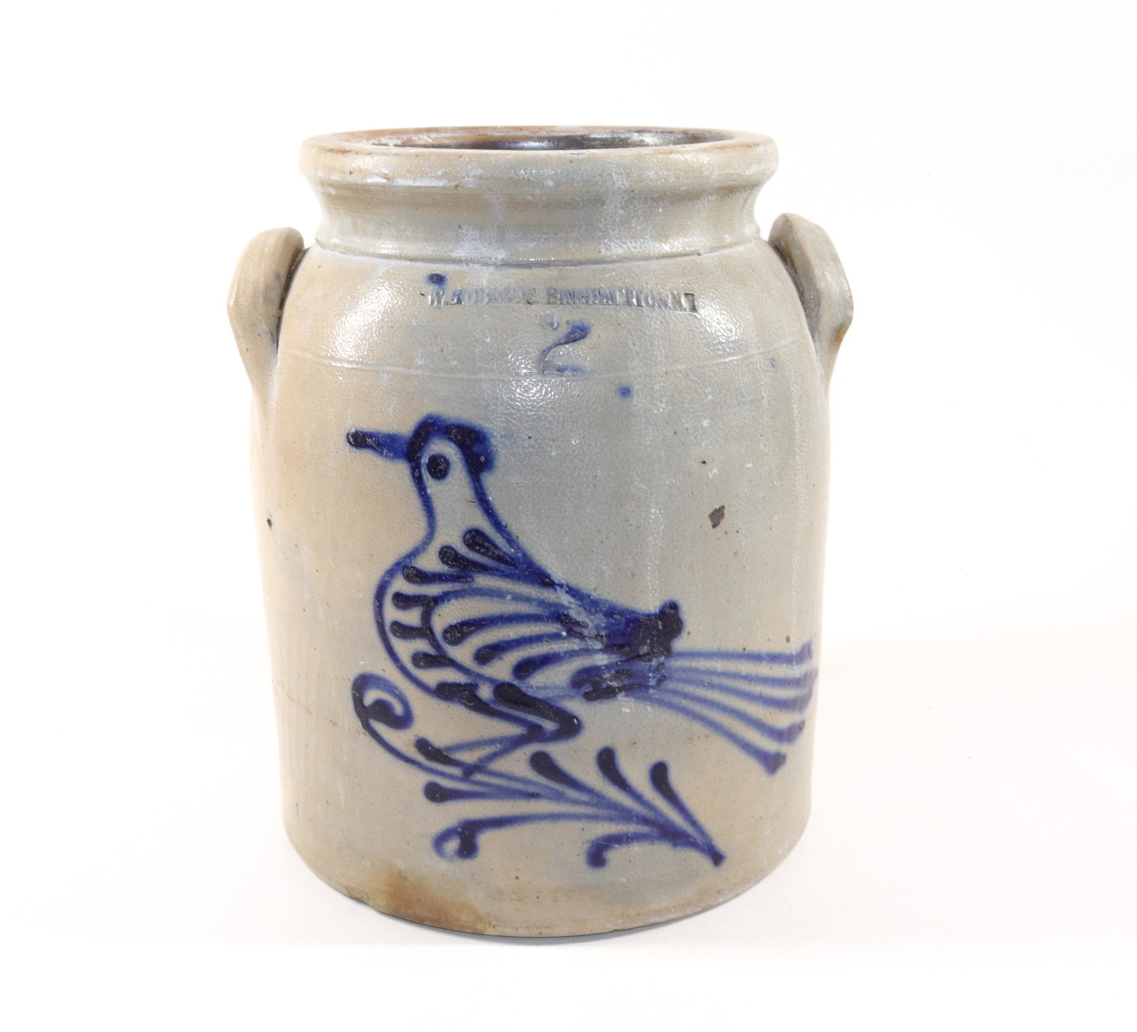 BLUE DECORATED STONEWARE CROCK: TWO GALLON CROCK WITH DARK BLUE BIRD DECORATION. IMPRESSED "W. ROBERTS, BINGHAMTON, NY" Size: 11" H