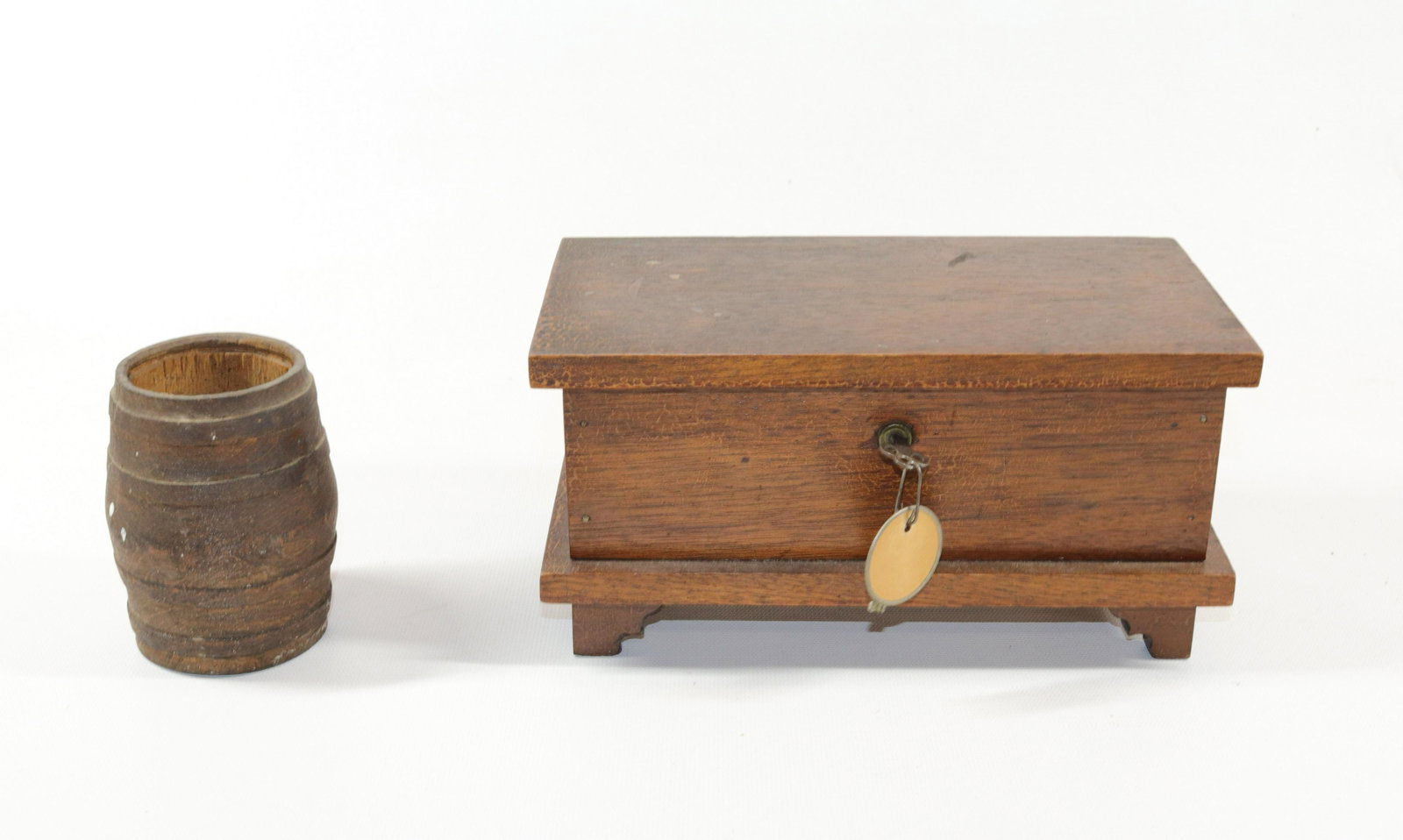 HANDMADE MINIATURE CHEST AND BARREL: HINGED WOODEN CHEST WITH BRACKET FEET AND KEY WITH TURNED WOODEN BARREL Size: 4 1/2" X 8 3/4" X 4 1/2"