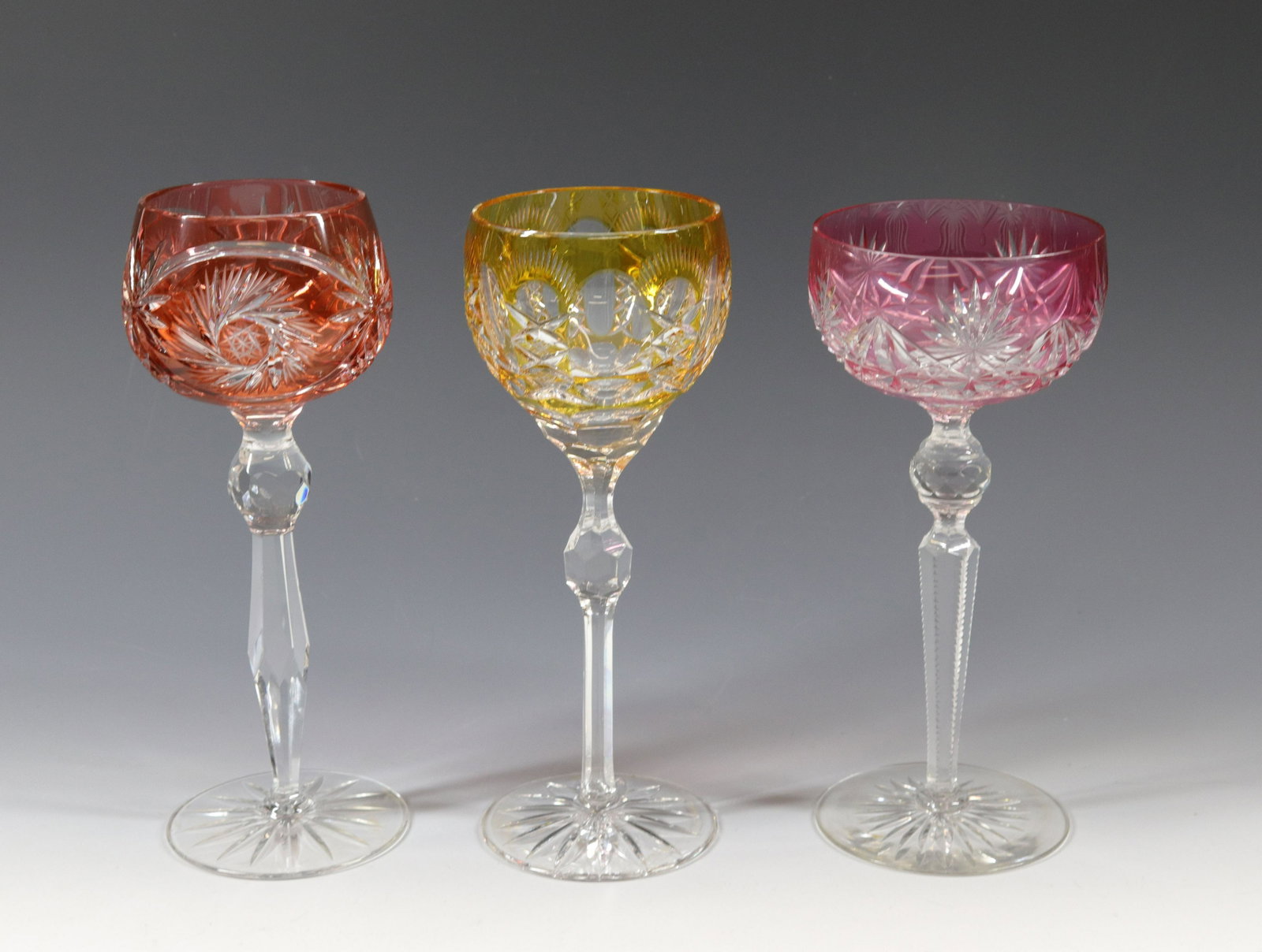 MOSER STYLE CUT GLASS WINE GLASSES: (3) OVERLAY CUT WINES IN CRANBERRY, YELLOW, AND ORANGE-RED Size: 8 1/4" X 8"