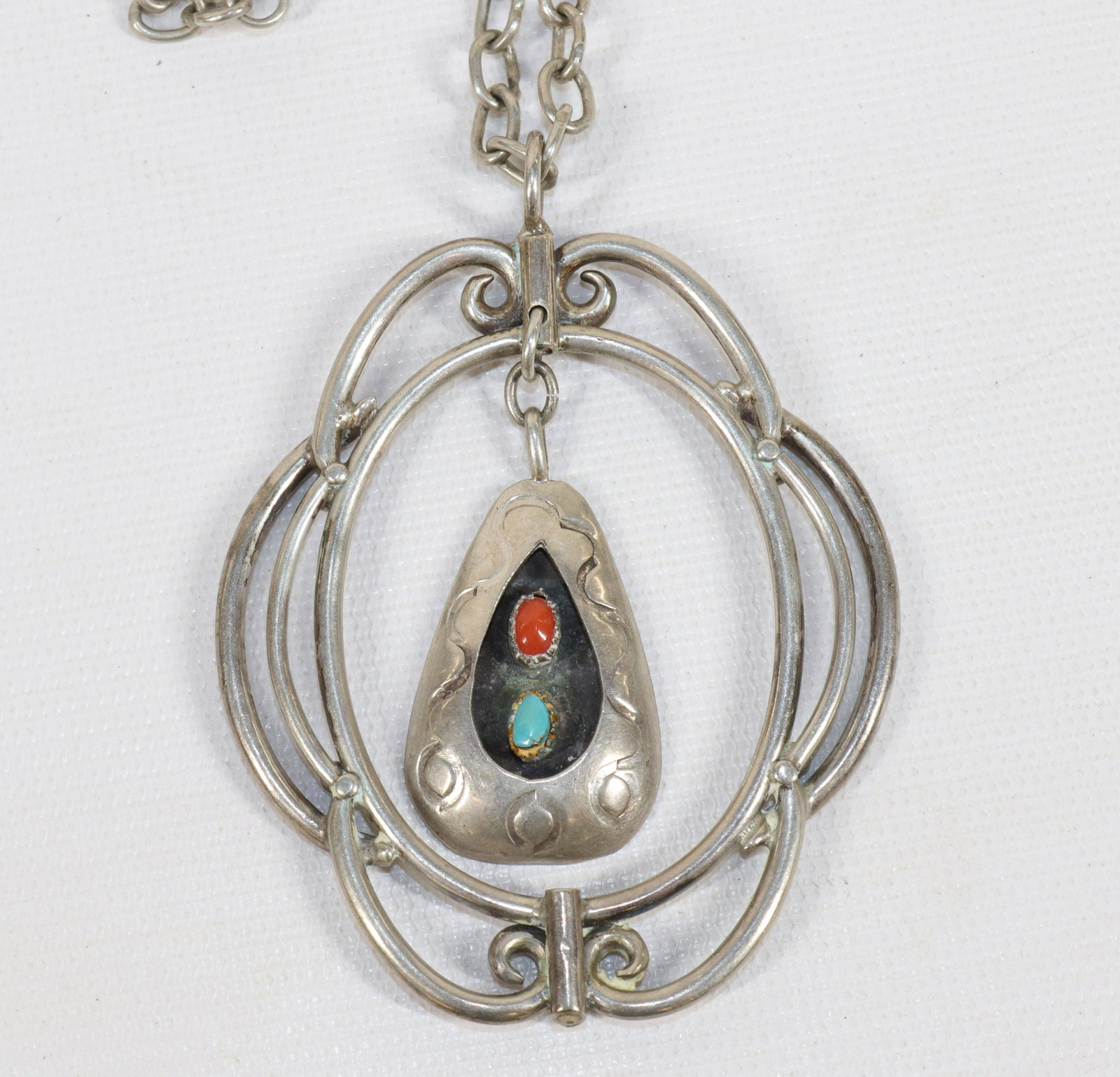 NATIVE AMERICAN SILVER CHAIN AND PENDANT: SILVER SET WITH TURQUOISE AND CARNELIAN Size: 3 1/2" X 2 1/2" - CHAIN 28 1/2"