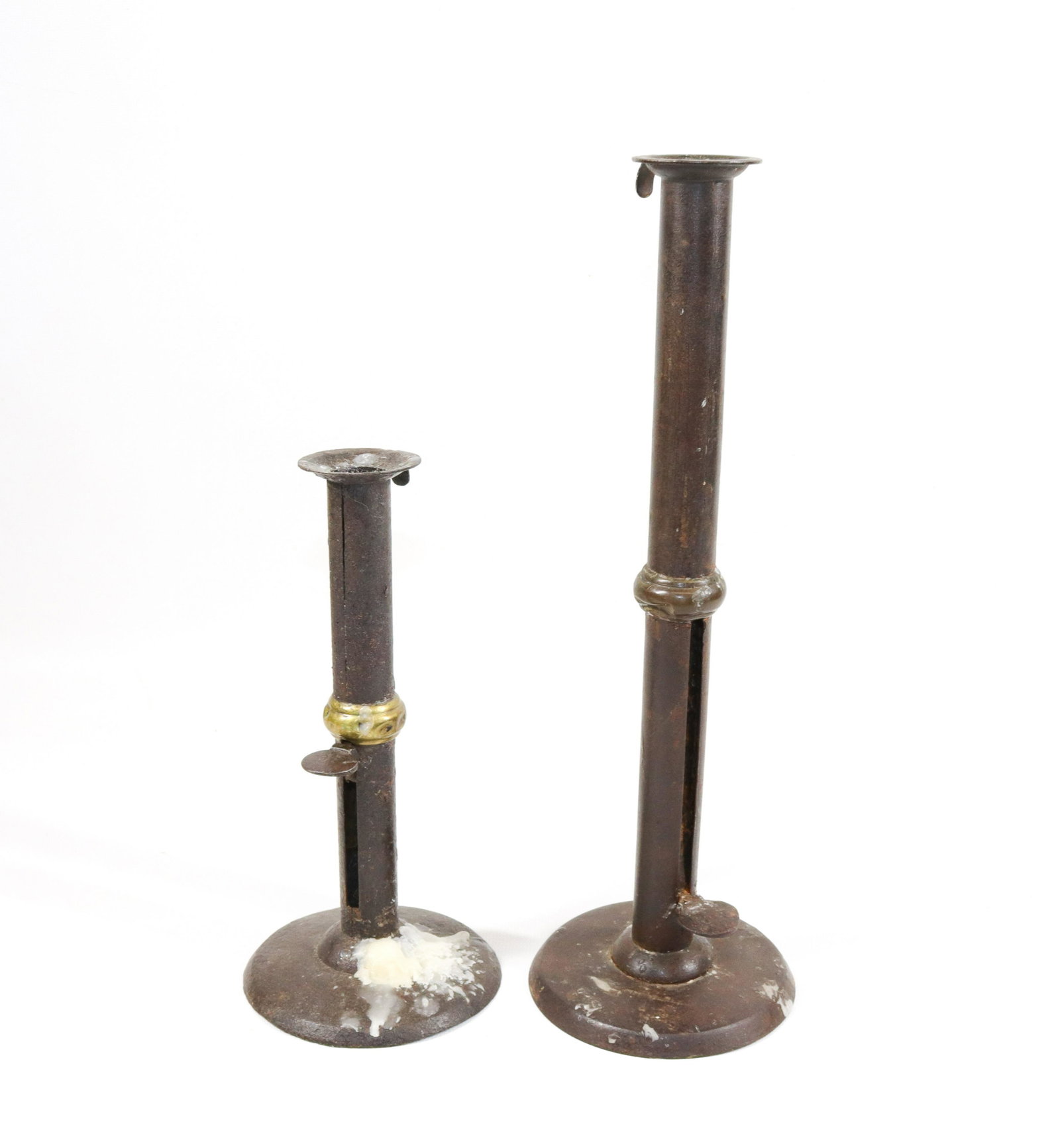 PAIR OF WEDDING BAND CANDLESTICKS: IRON HOG SCRAPER STYLE WITH BRASS BANDS. THUMB LATCH Size: 8" TO 12" H
