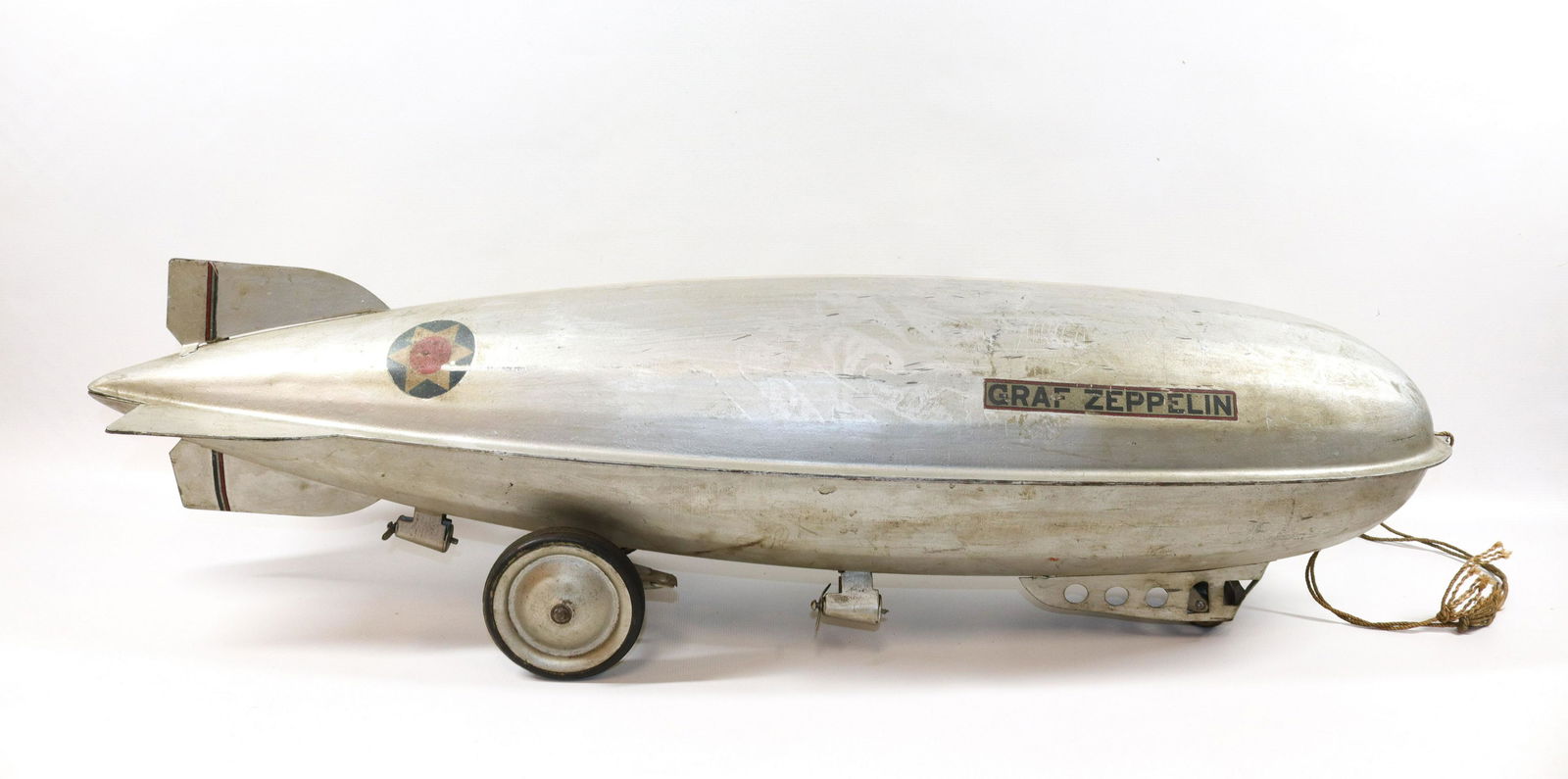 STEELCRAFT GRAF ZEPPELIN: PAINTED PULL-TOY WITH ORIGINAL DECALS Size: 30" L