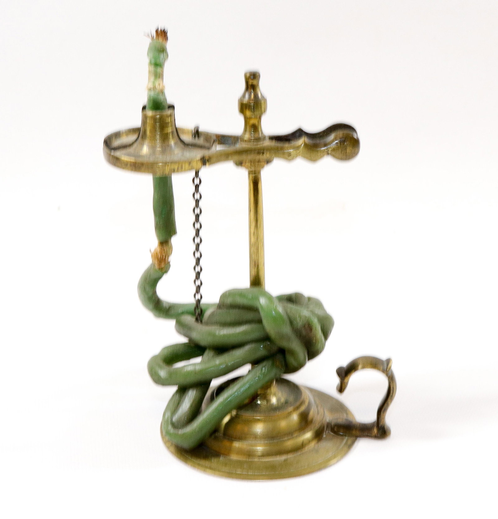 EARLY BRASS CANDLE JACK: FINGER RING AND WAX CANDLE Size: