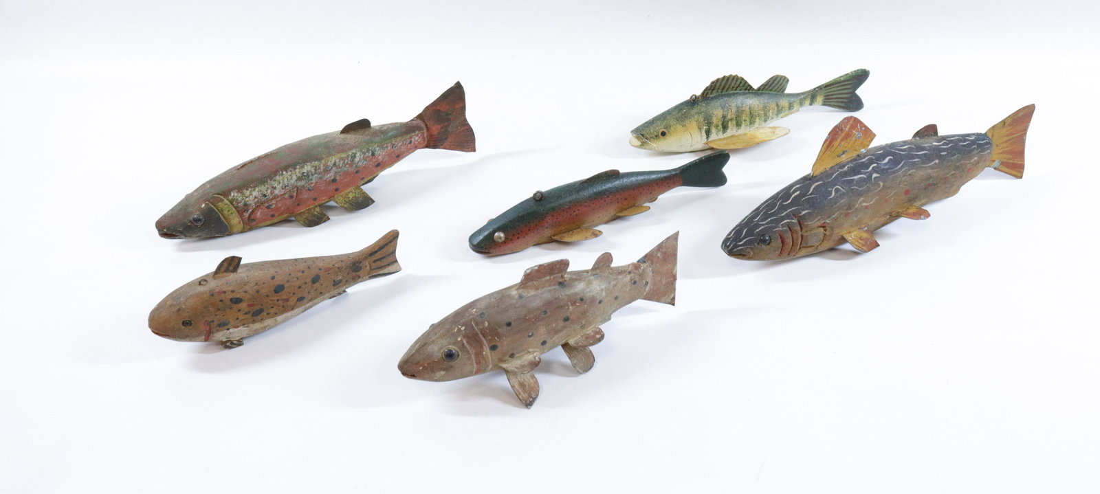 GROUP LOT OF ICE FISHING DECOYS: (6) CARVED AND PAINTED WOOD WITH TIN FINS AND LEAD WEIGHTING Size: 7" TO 11 1/2" L