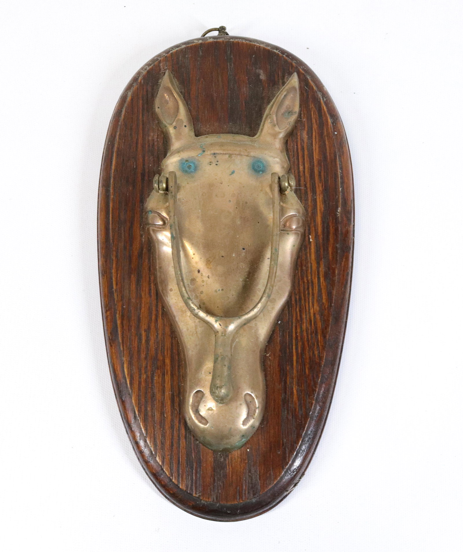 BRASS DOOR KNOCKER: IN THE FORM OF A HORSE HEAD - MOUNTED ON OAK BOARD Size: 12 1/2" X 6 1/2"