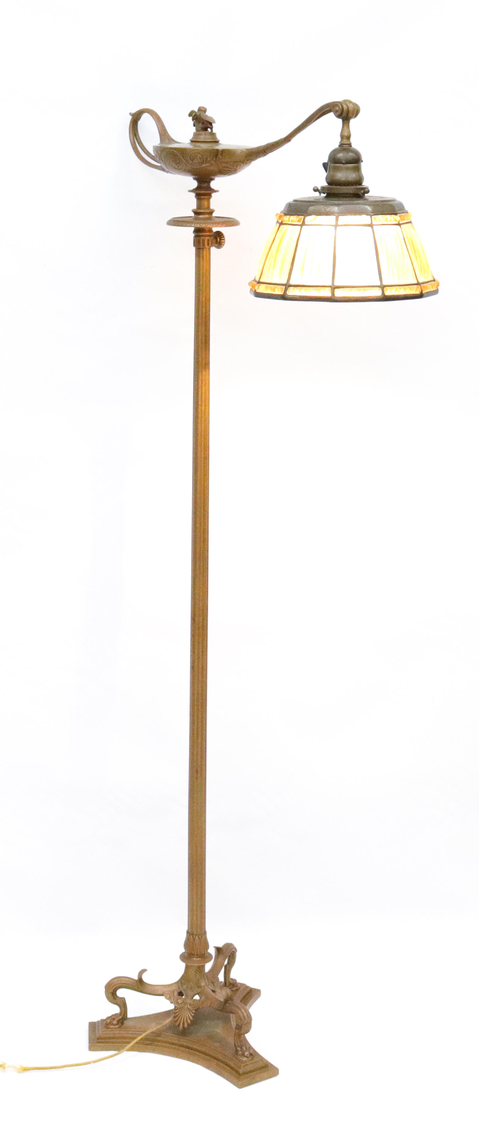 TIFFANY STUDIOS ALADDIN LAMP: AN ADJUSTABLE STANDARD FLOOR LIGHT WITH ALADDIN LAMP ARM, ACCOMPANIED BY A 9" LINEN FOLD SHADE - ACID ETCHED AND ORIGINAL GILDED Size: 9" SHADE