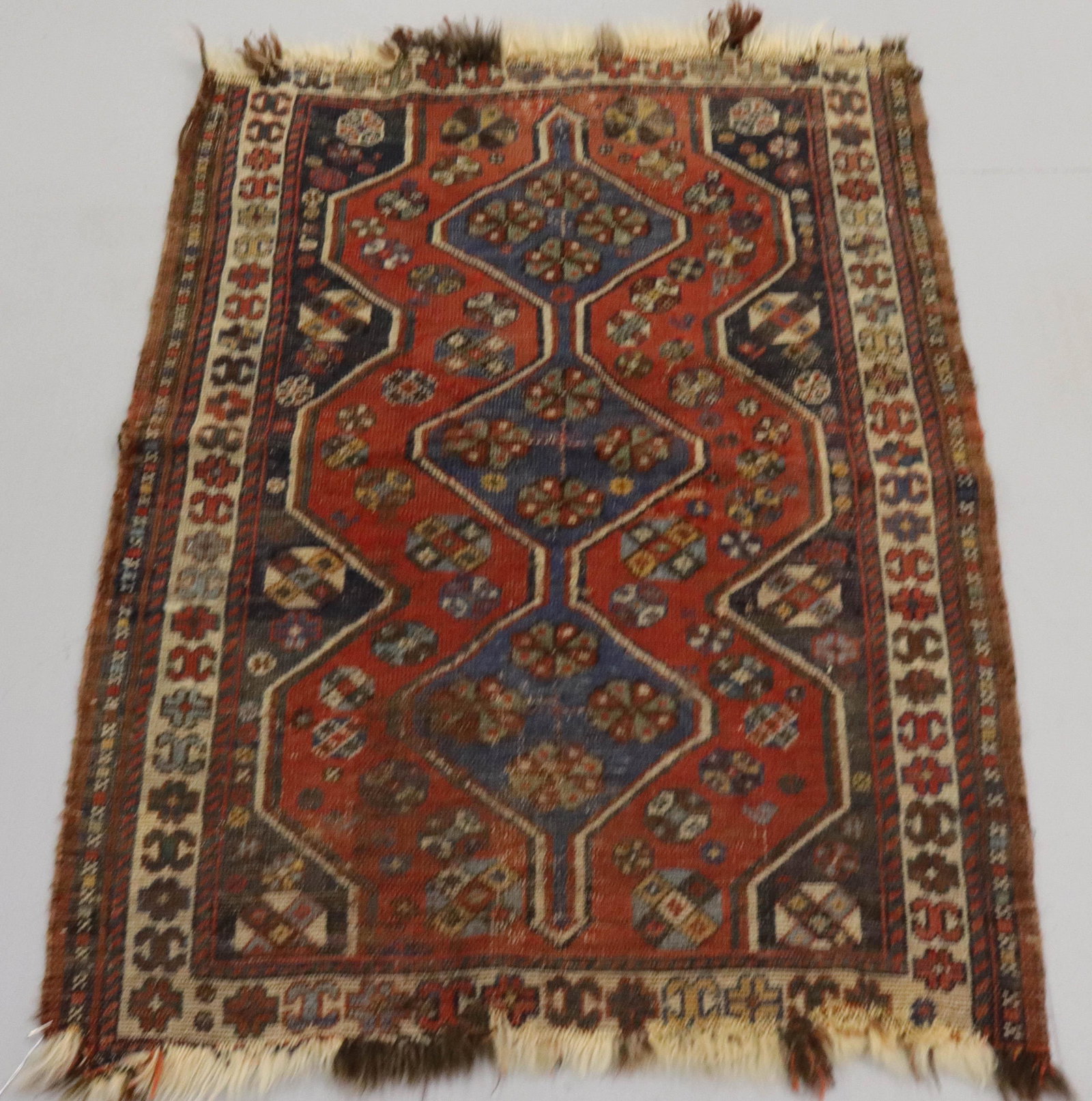 ANTIQUE ORIENTAL THROW RUG: GEOMETRIC DESIGN BOARD WITH HORSE HANDLE - "MHJDB" INITIALS - COLORS IN RED, YELLOW, AND GREEN - HANDMADE Size: 43 1/2" X 32 1/2"